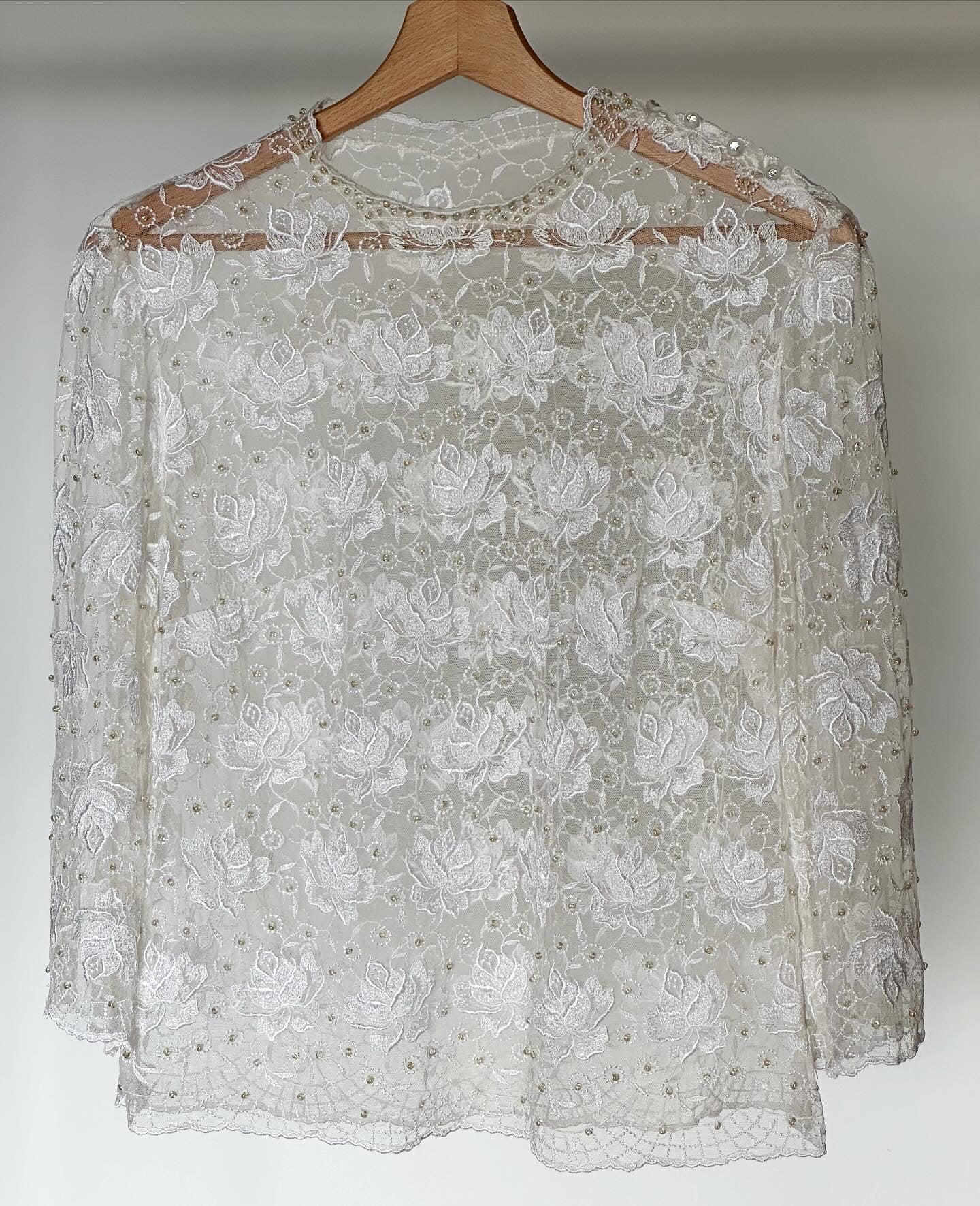 Beautiful vintage lace blouse with flowers and beads