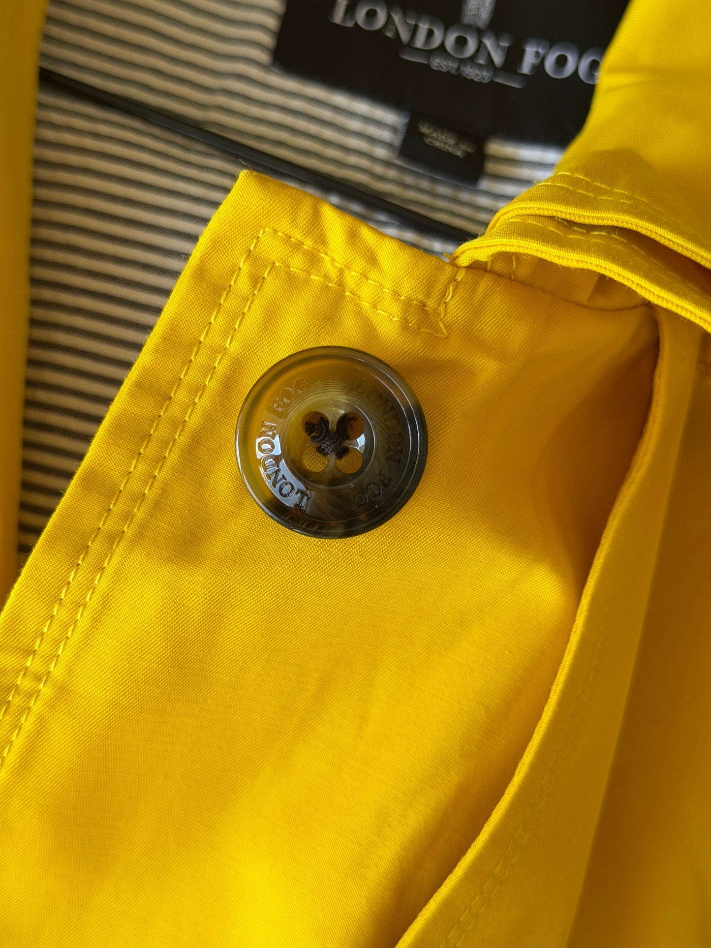 Vibrant yellow London Fog trench coat