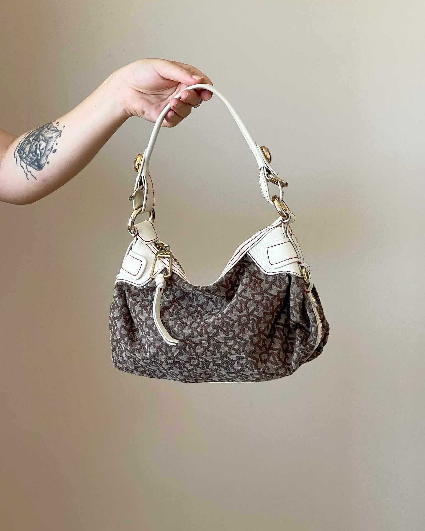 Trendy authentic DKNY vintage bag with monogram logo print