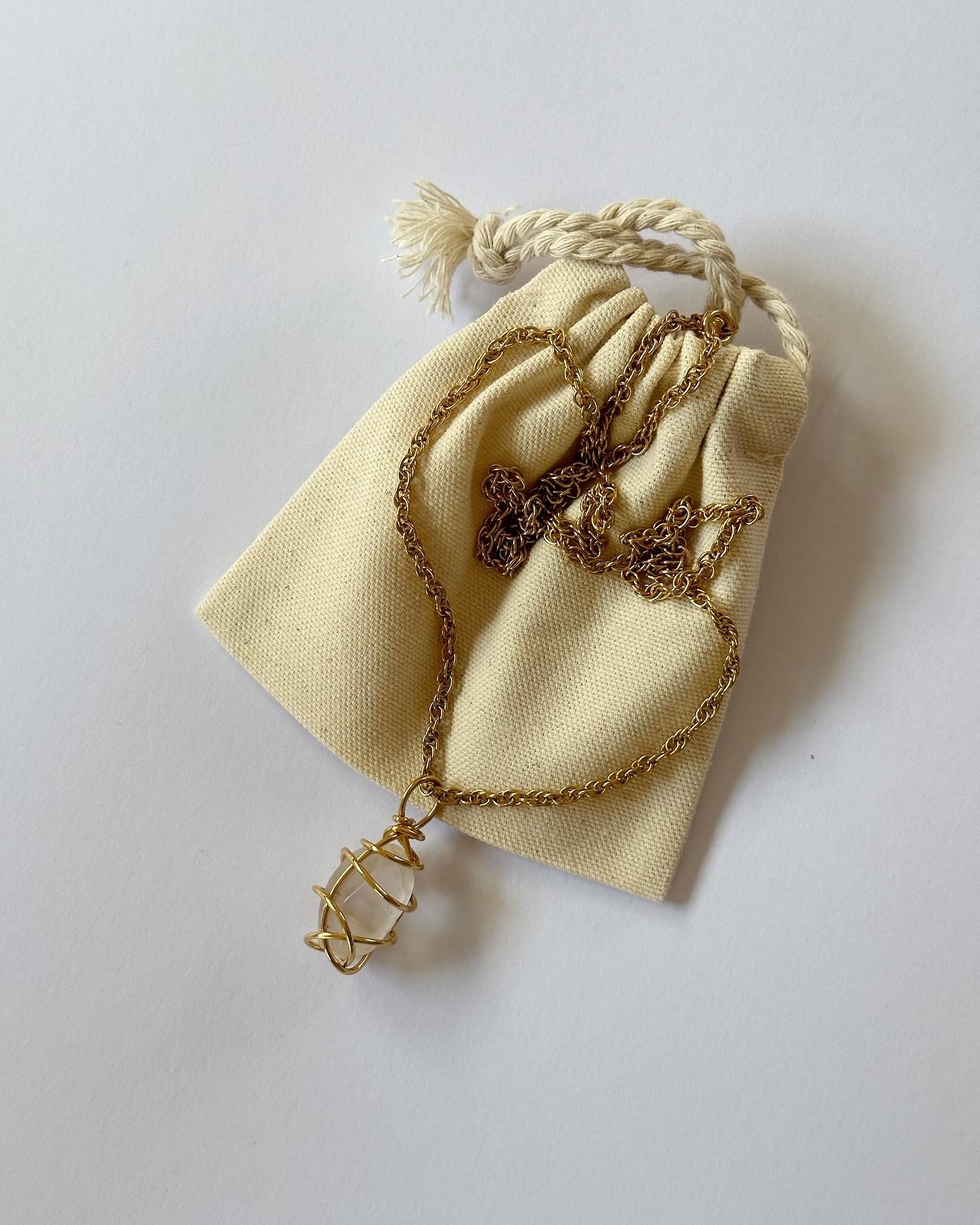 Vintage long gold-tone necklace with natural stone pendant by Avon
