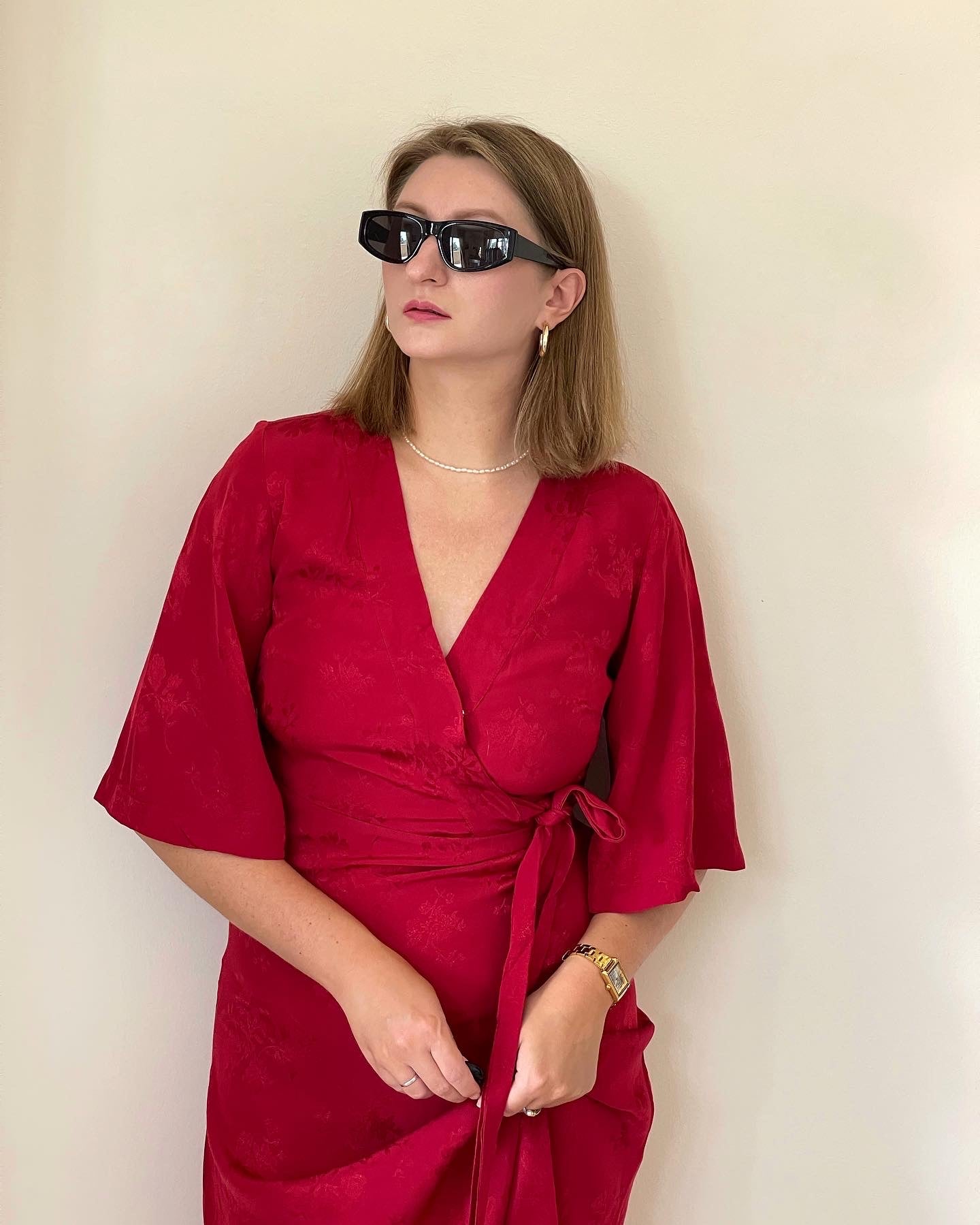 Beautiful feminine red dress made from viscose with jacquard pattern