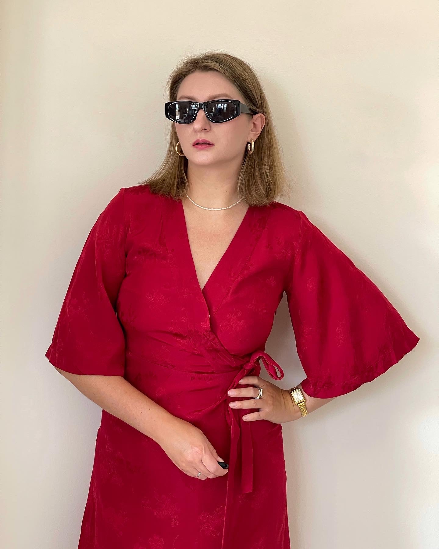 Beautiful feminine red dress made from viscose with jacquard pattern