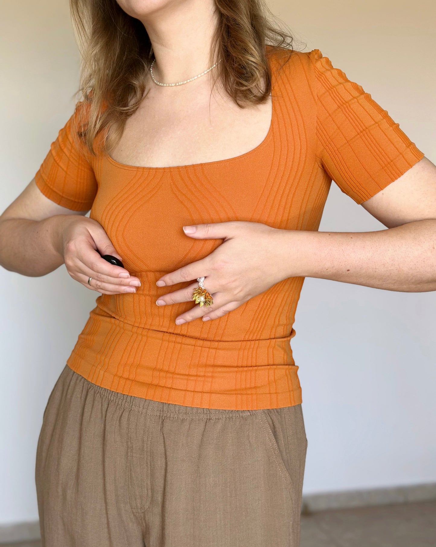 Vintage Wolford top in a striking orange hue