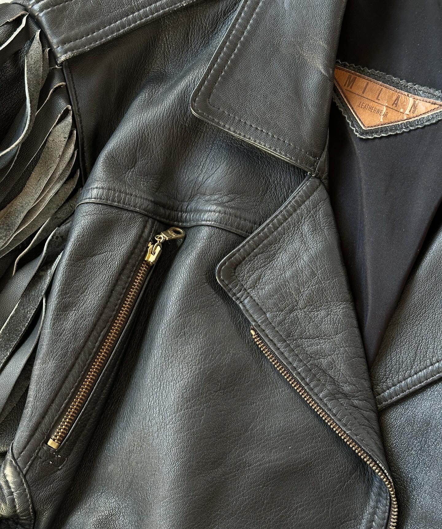 Stunning vintage leather jacket with fringe
