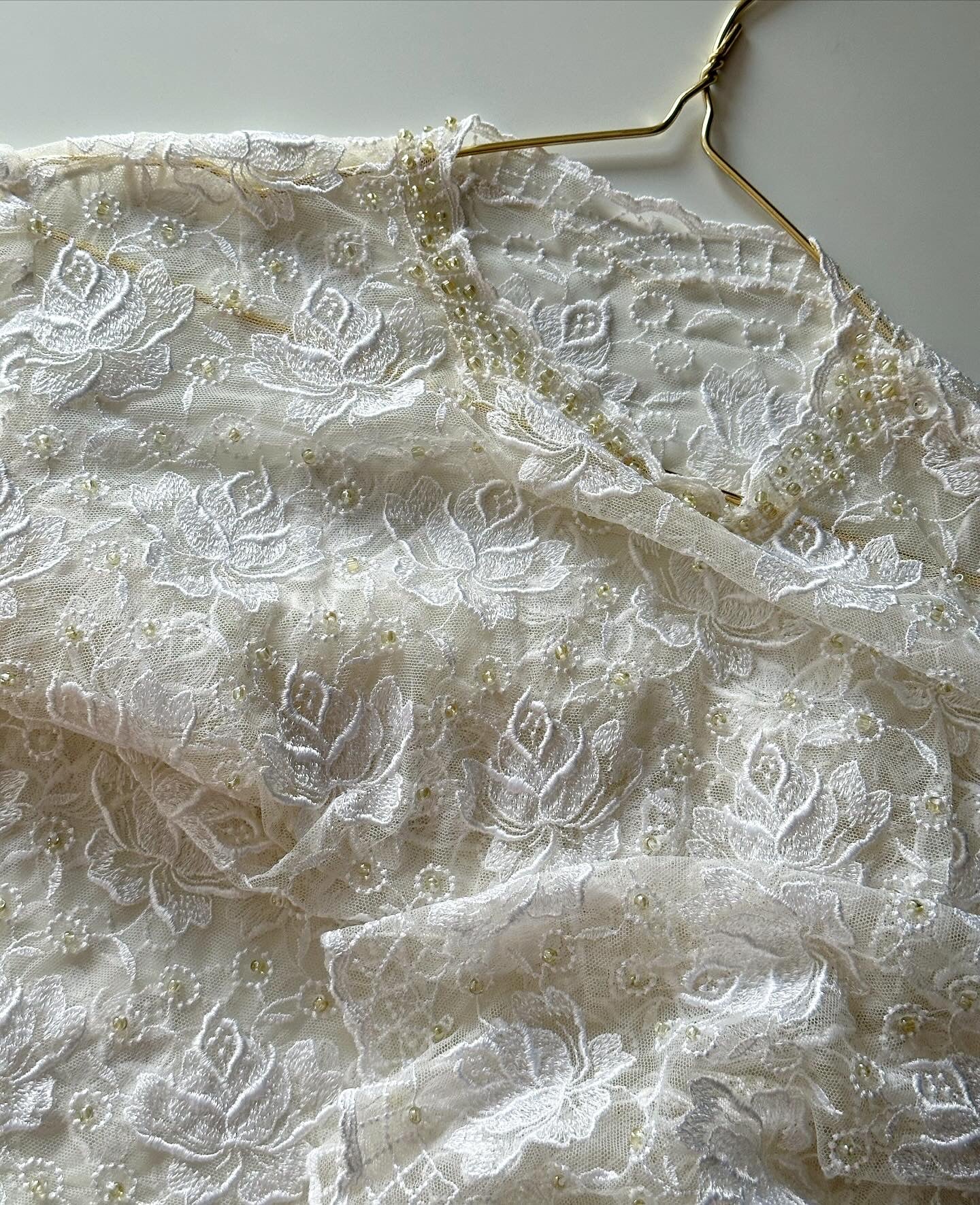 Beautiful vintage lace blouse with flowers and beads