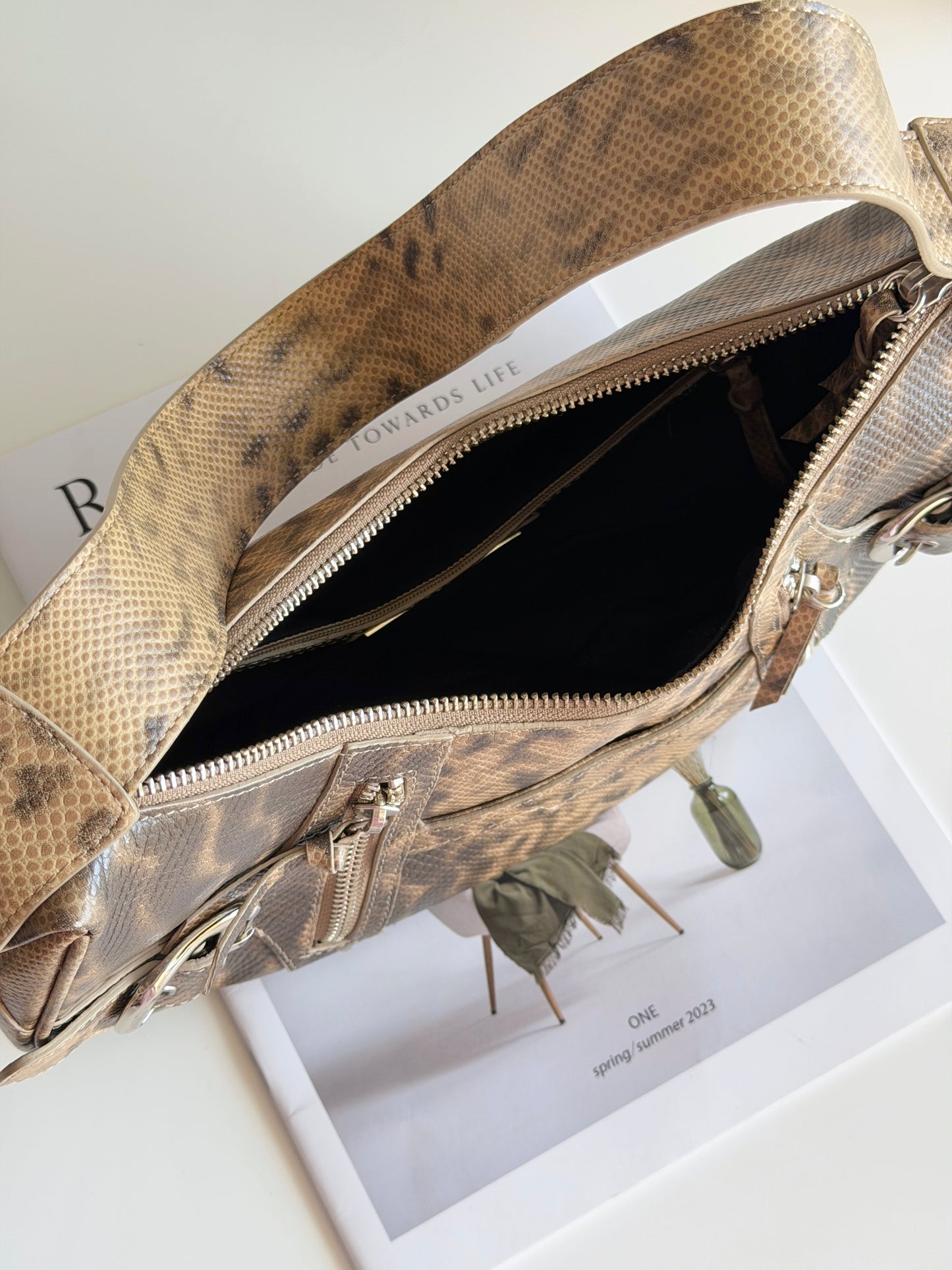 Stylish vintage DKNY shoulder bag in a snakeskin pattern