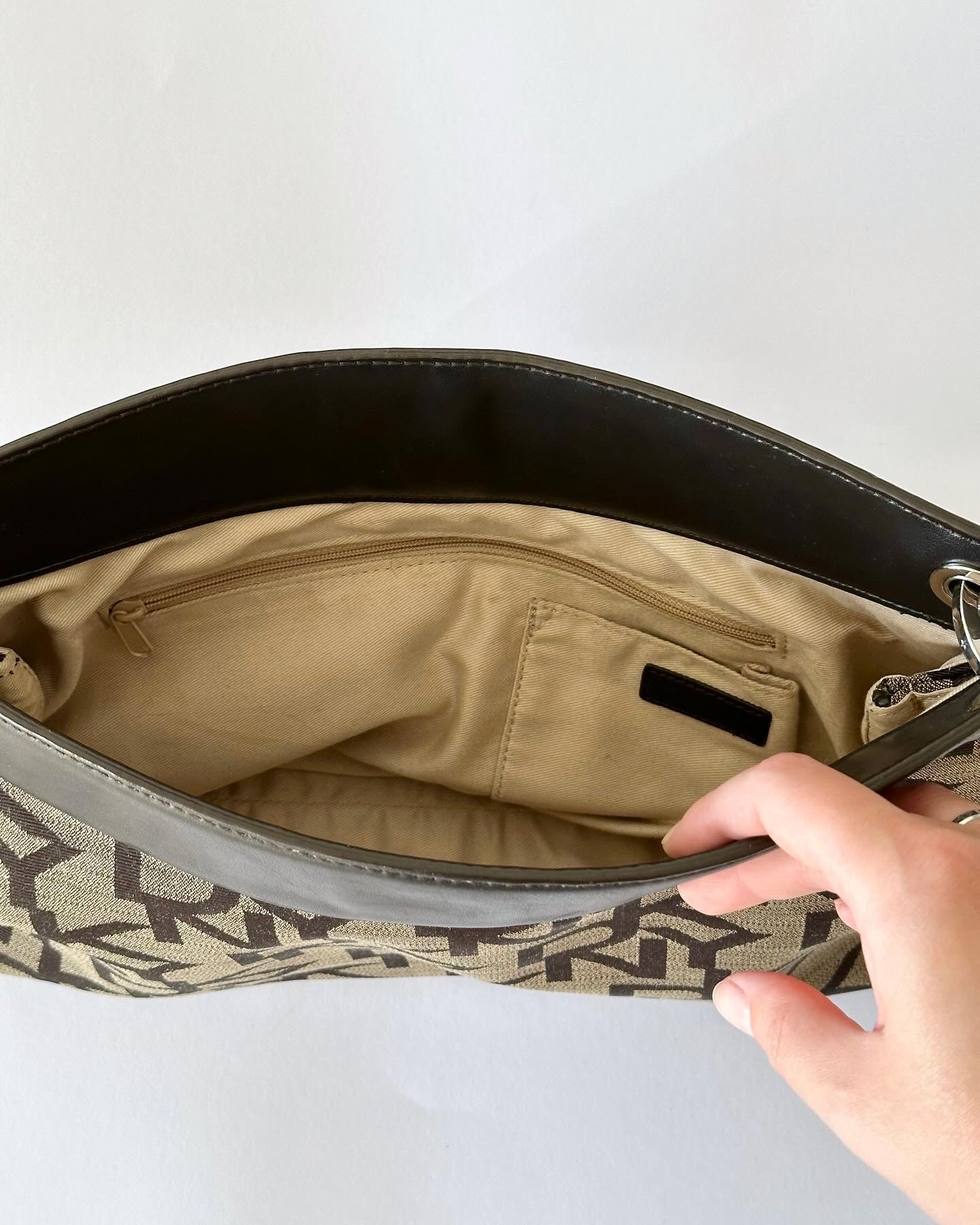 Trendy vintage DKNY bag with monogram print
