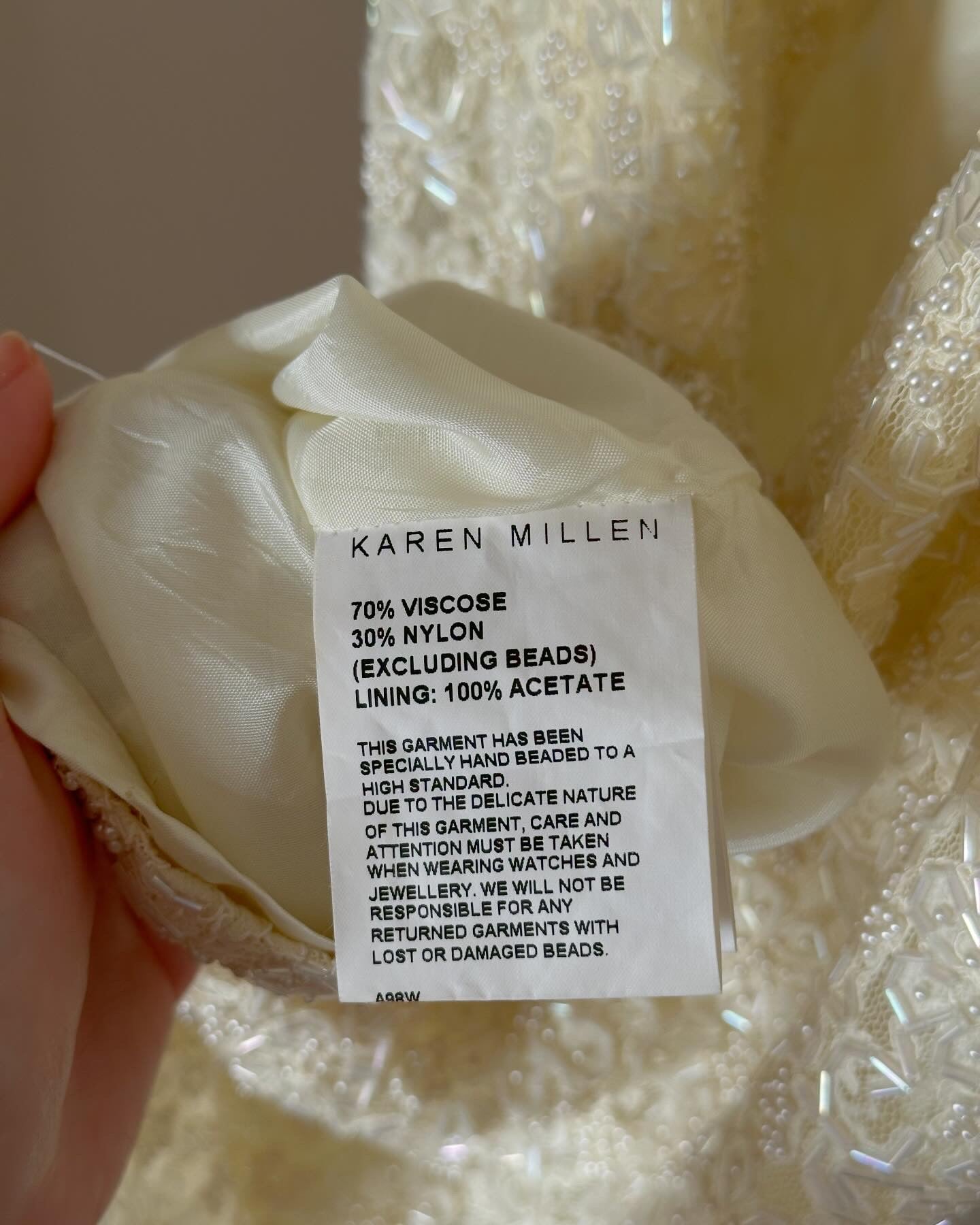 Gorgeous vintage mini dress by Karen Millen with beads