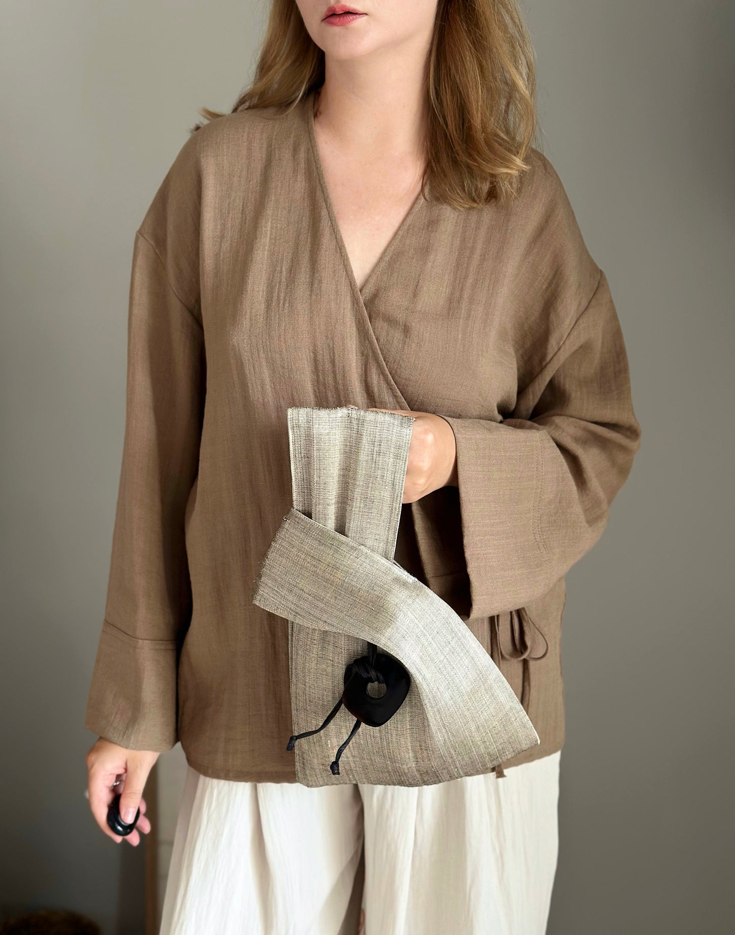 An elegant hand-held clutch