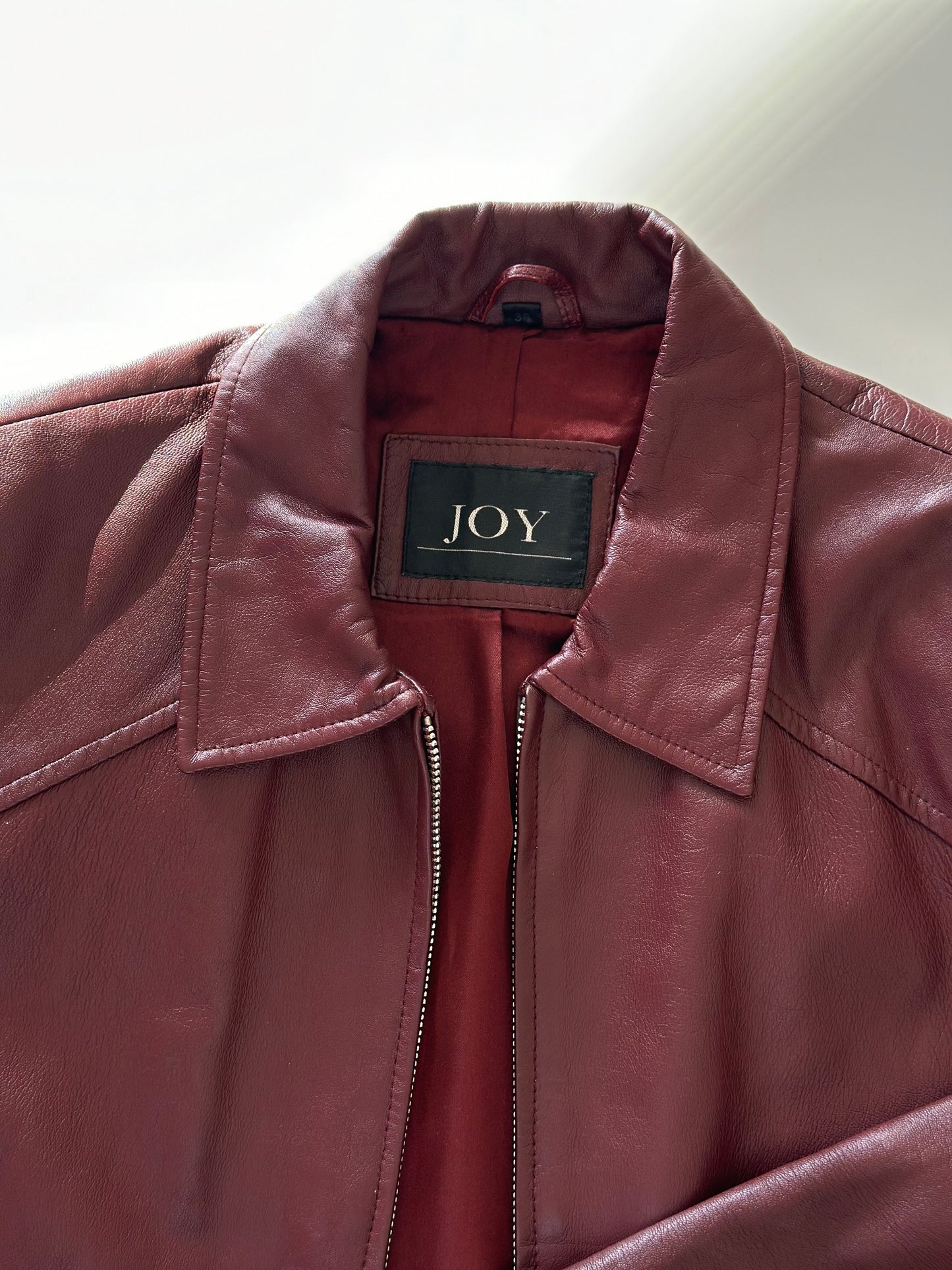 Trendy vintage burgundy leather jacket