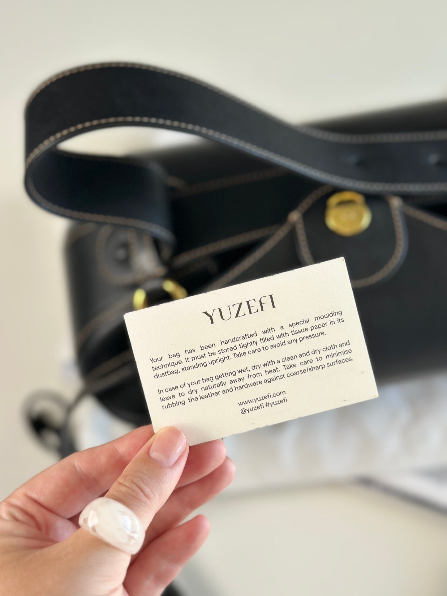 Stunning Yuzefi Loaf Bag crafted from black leather