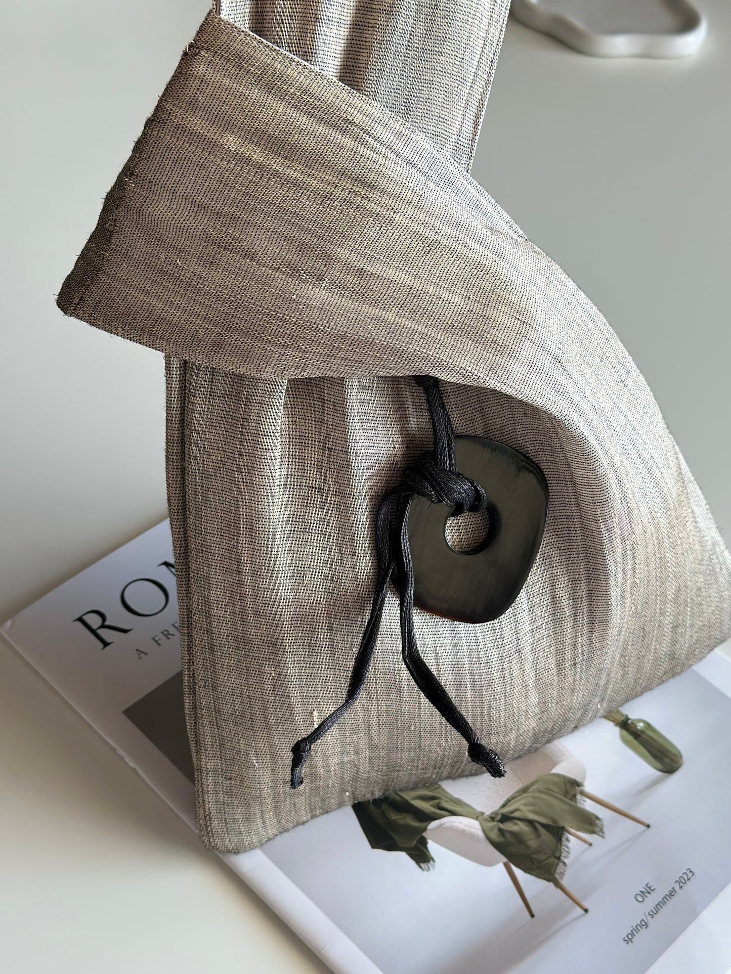 An elegant hand-held clutch
