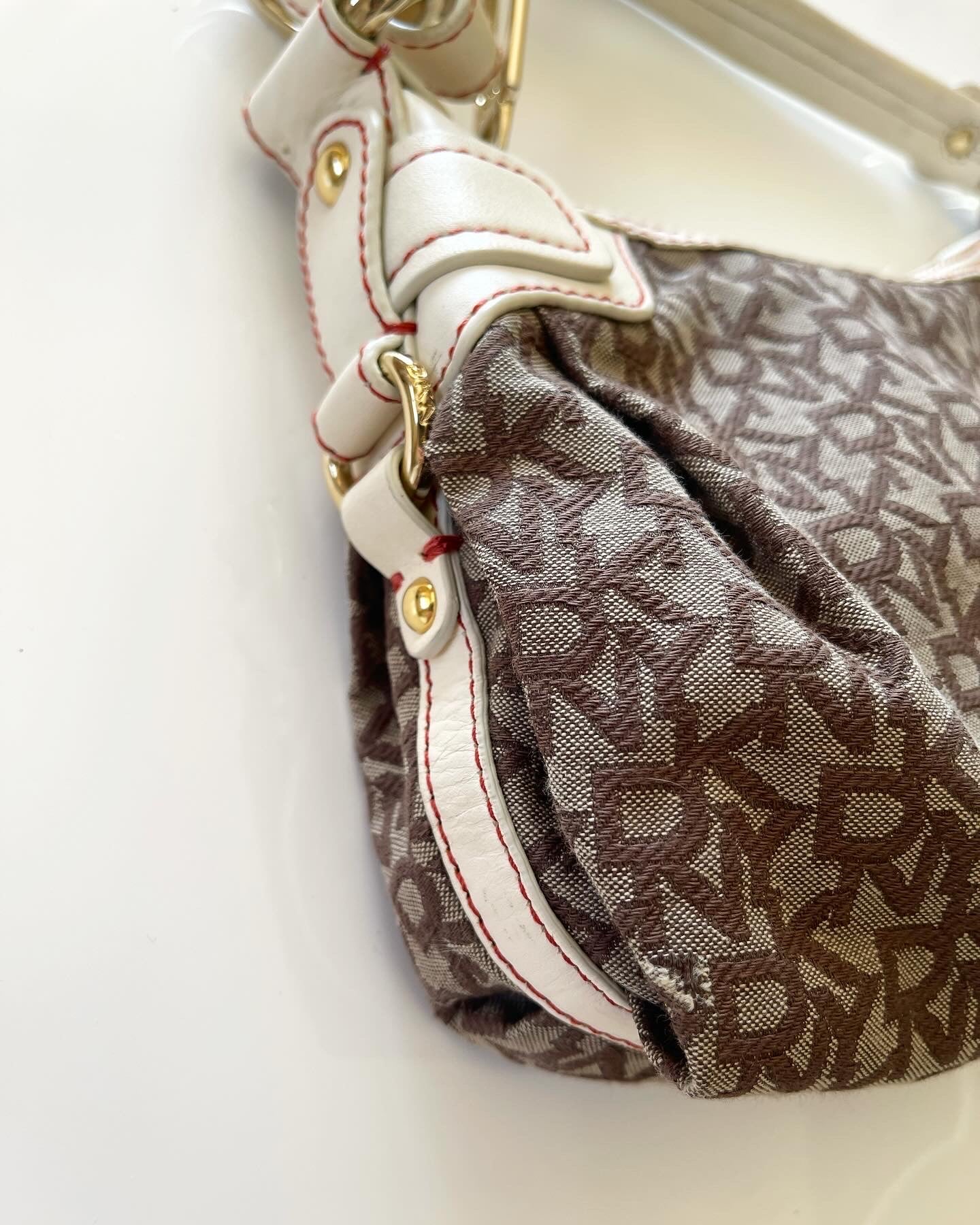 Trendy authentic DKNY vintage bag with monogram logo print