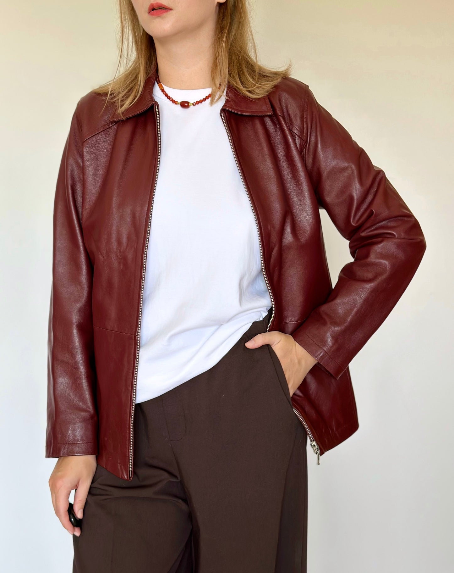 Trendy vintage burgundy leather jacket