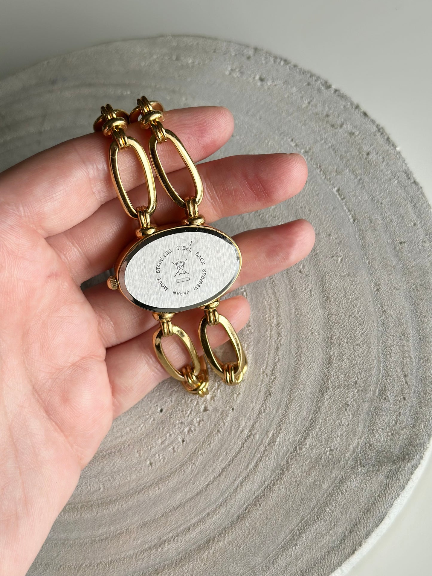 Vintage bracelet watch by Avon with hidden dial