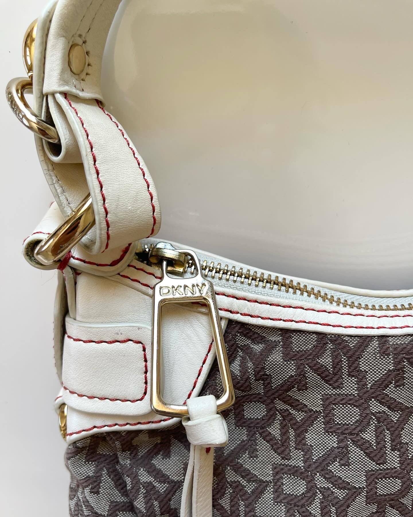 Trendy authentic DKNY vintage bag with monogram logo print