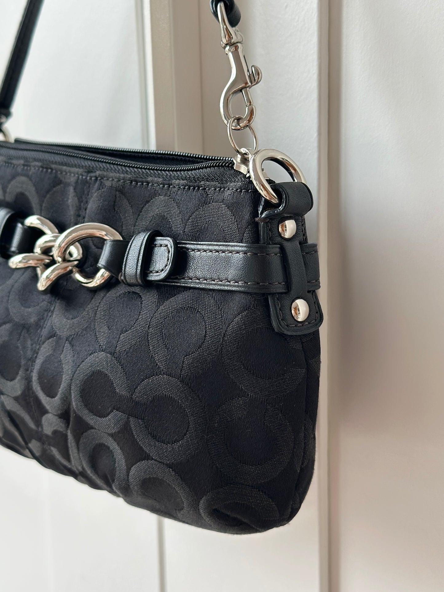 Timeless vintage authentic Coach wristlet bag