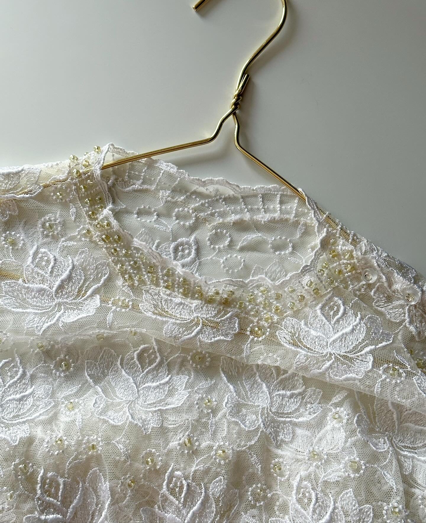 Beautiful vintage lace blouse with flowers and beads