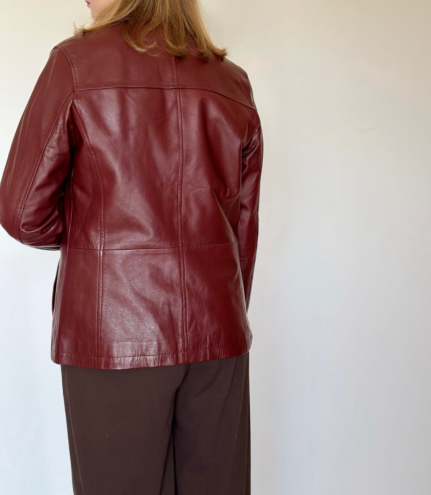 Trendy vintage burgundy leather jacket