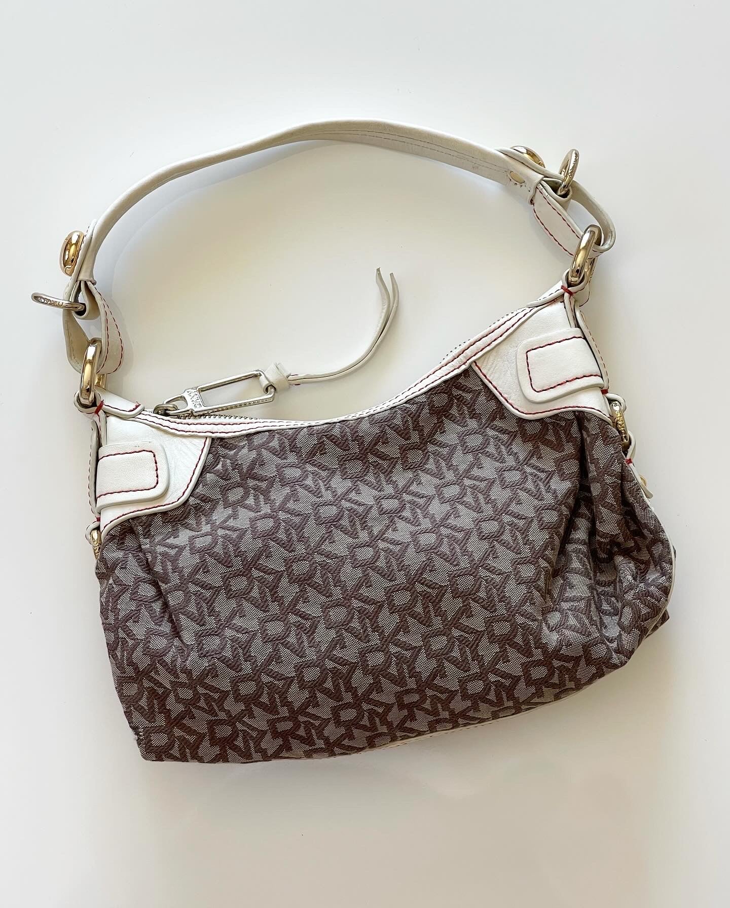 Trendy authentic DKNY vintage bag with monogram logo print