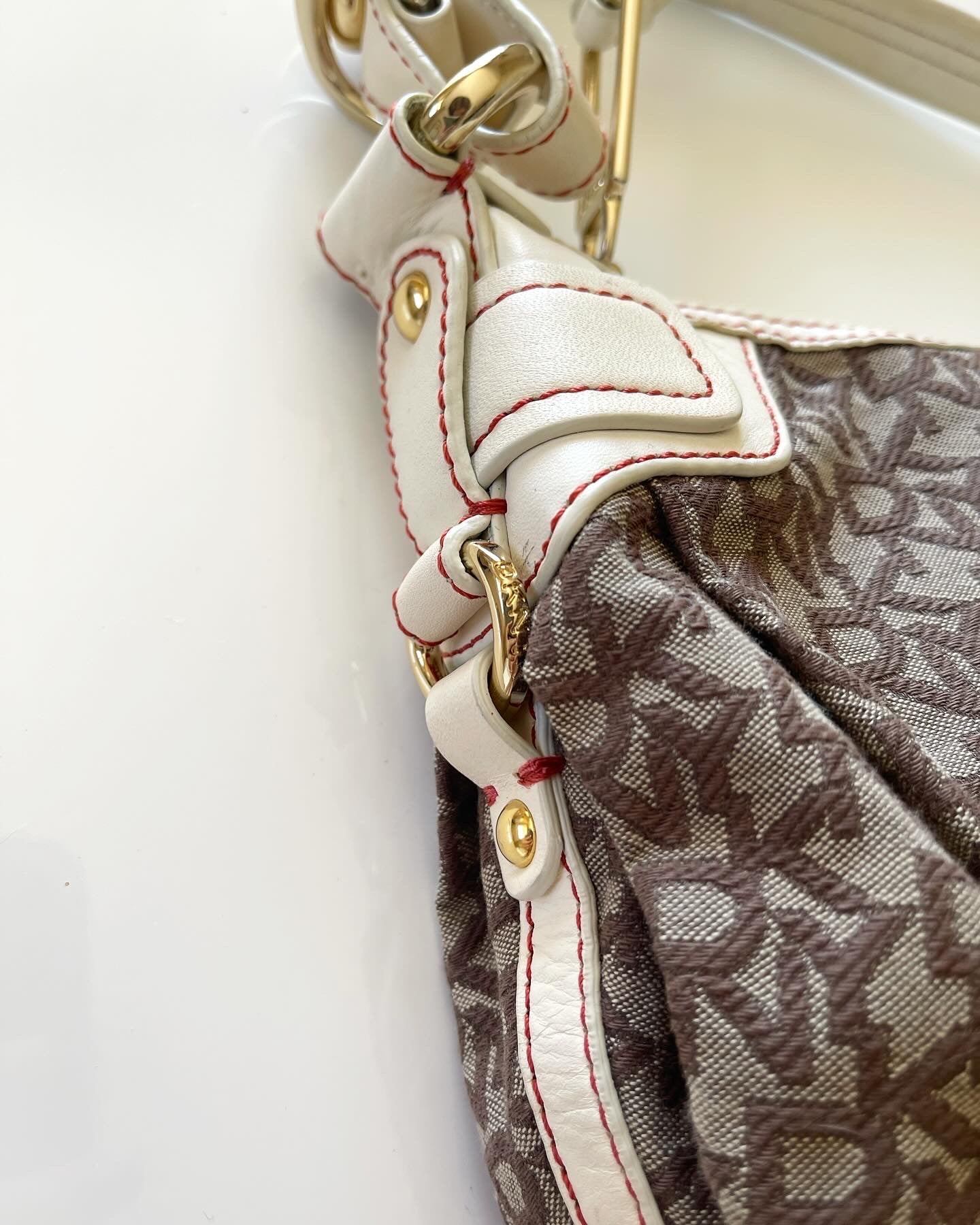 Trendy authentic DKNY vintage bag with monogram logo print