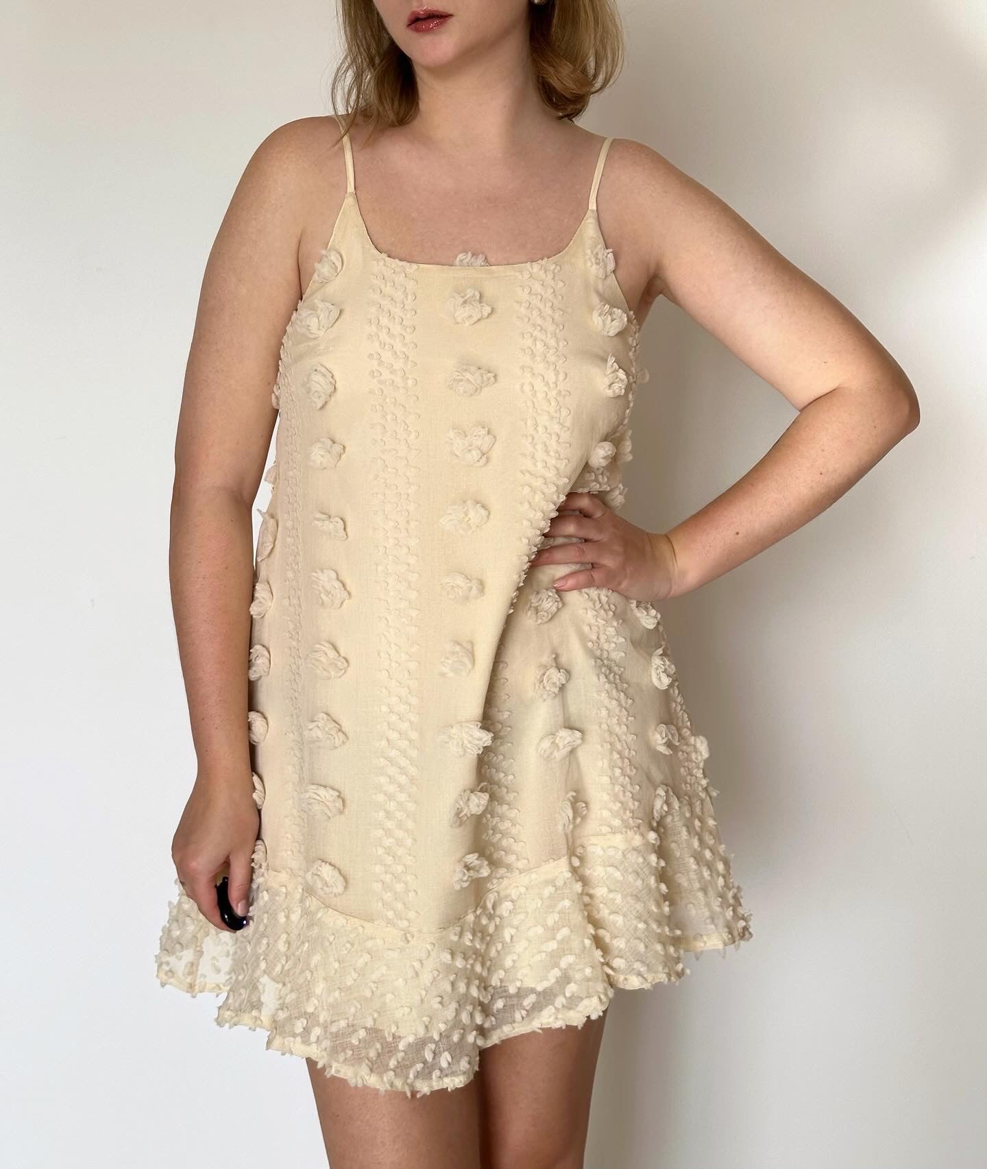 Lovely ivory mini dress with voluminous flowers decoration