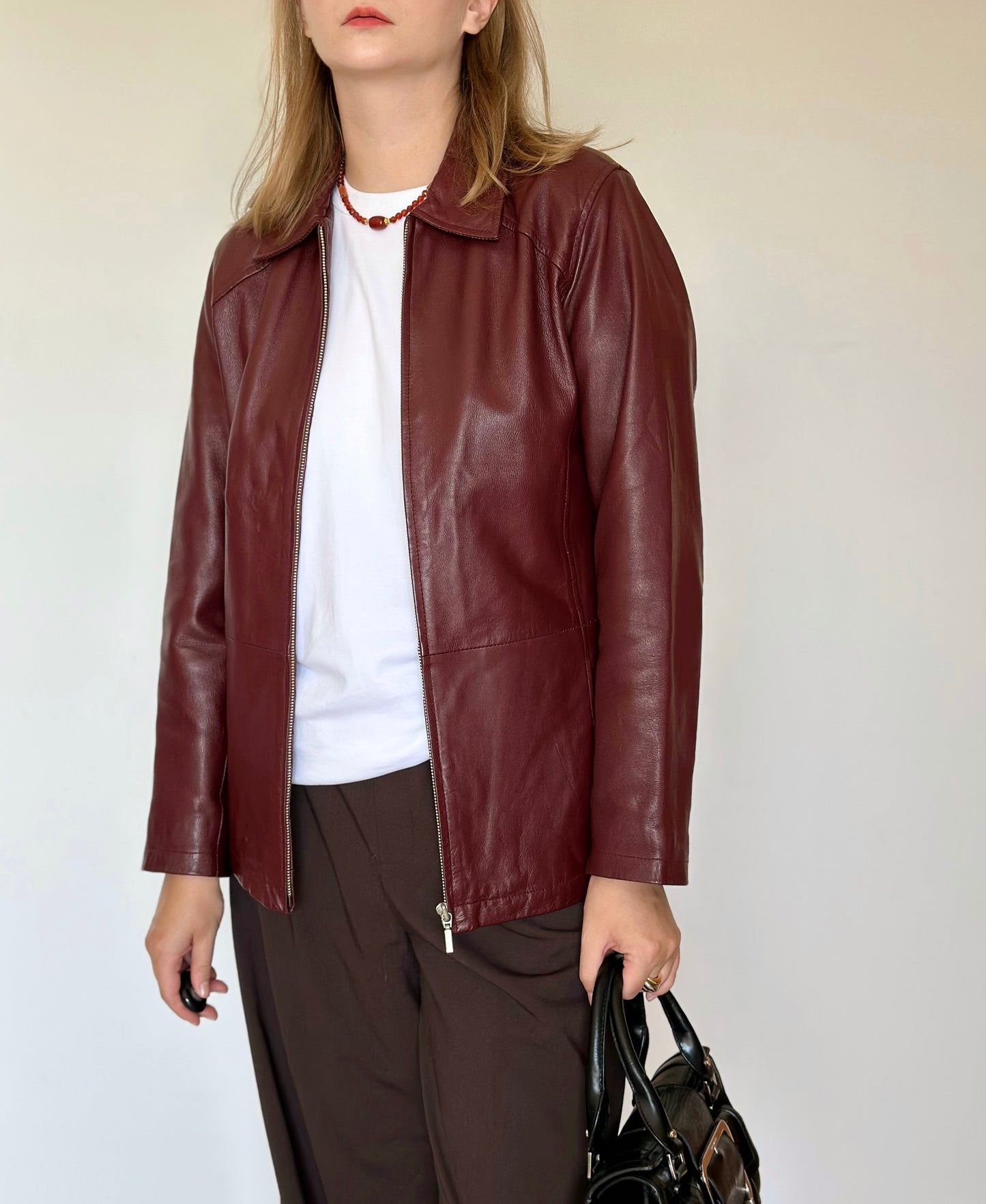 Trendy vintage burgundy leather jacket