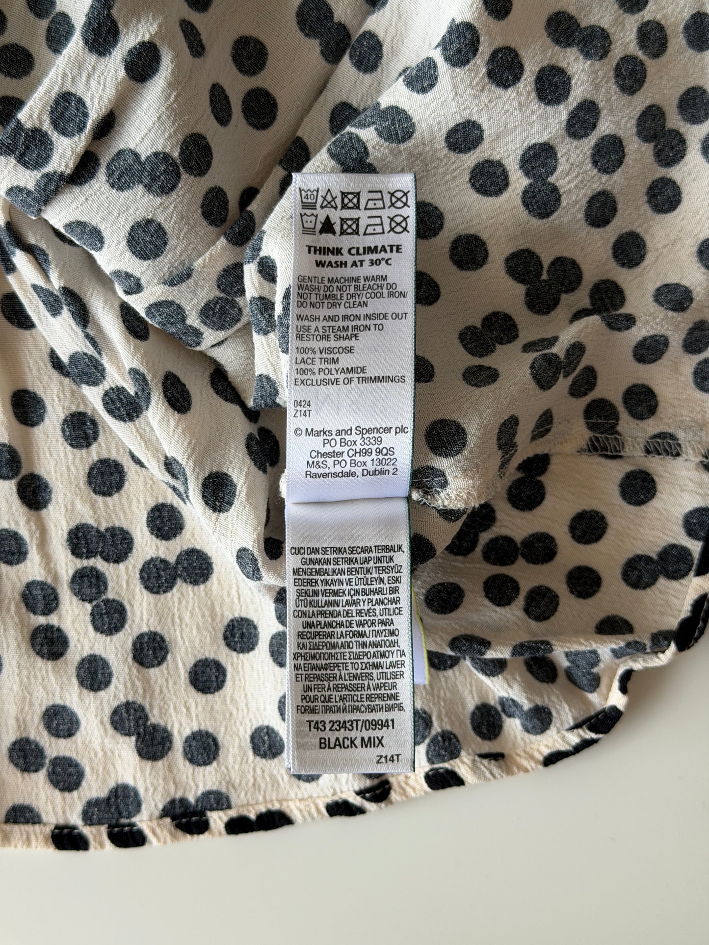 Polka dot blouse with lace