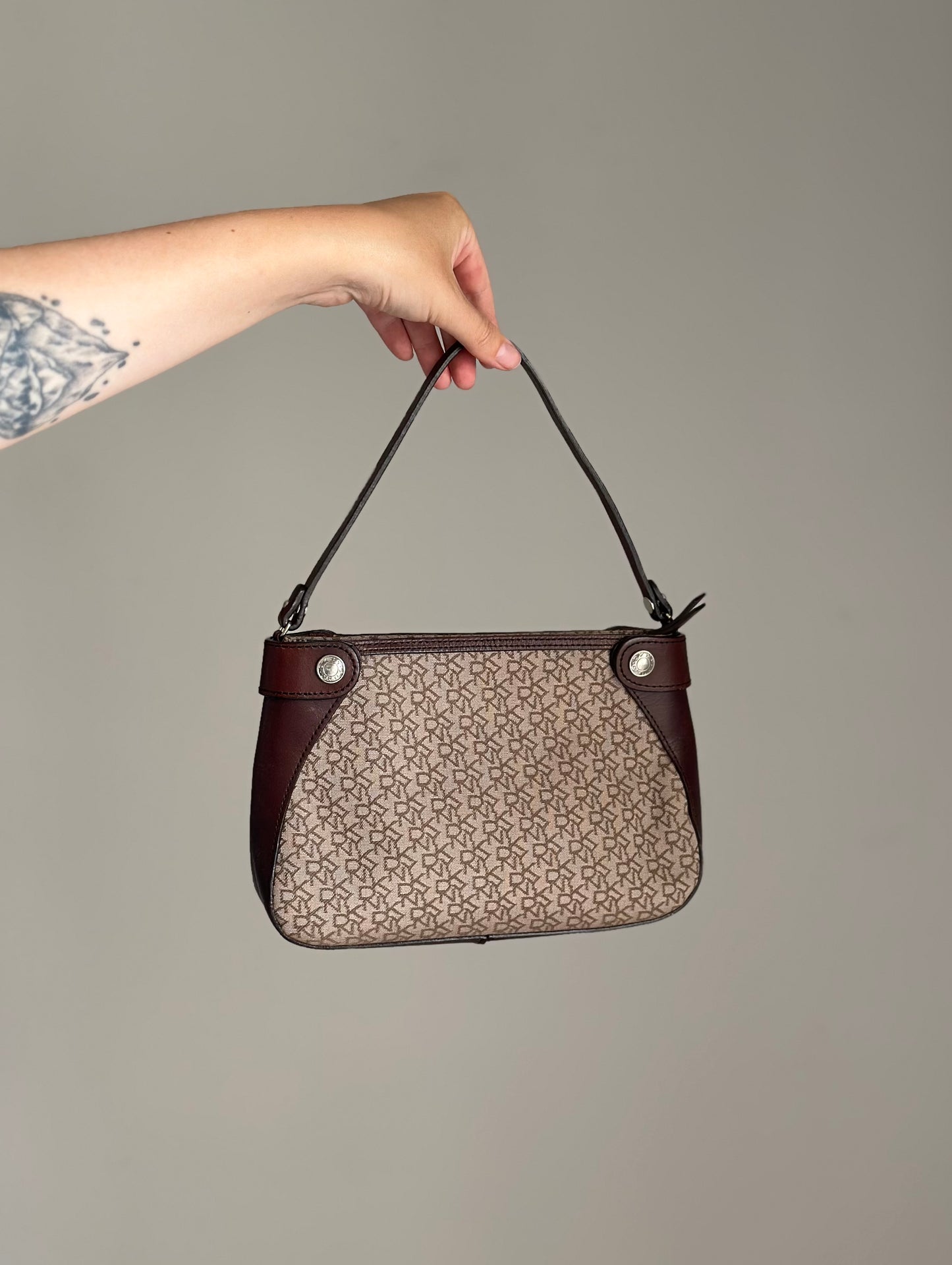 Vintage DKNY shoulder bag with a sleek, urban feel