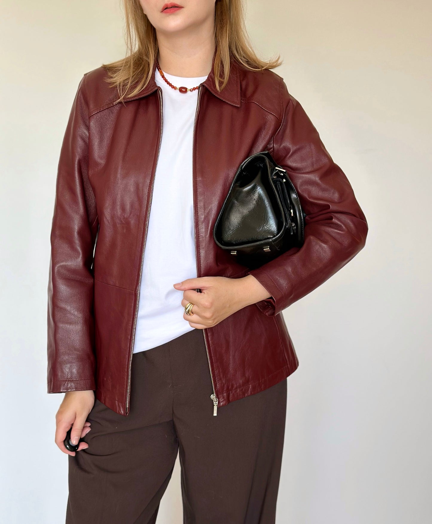 Trendy vintage burgundy leather jacket