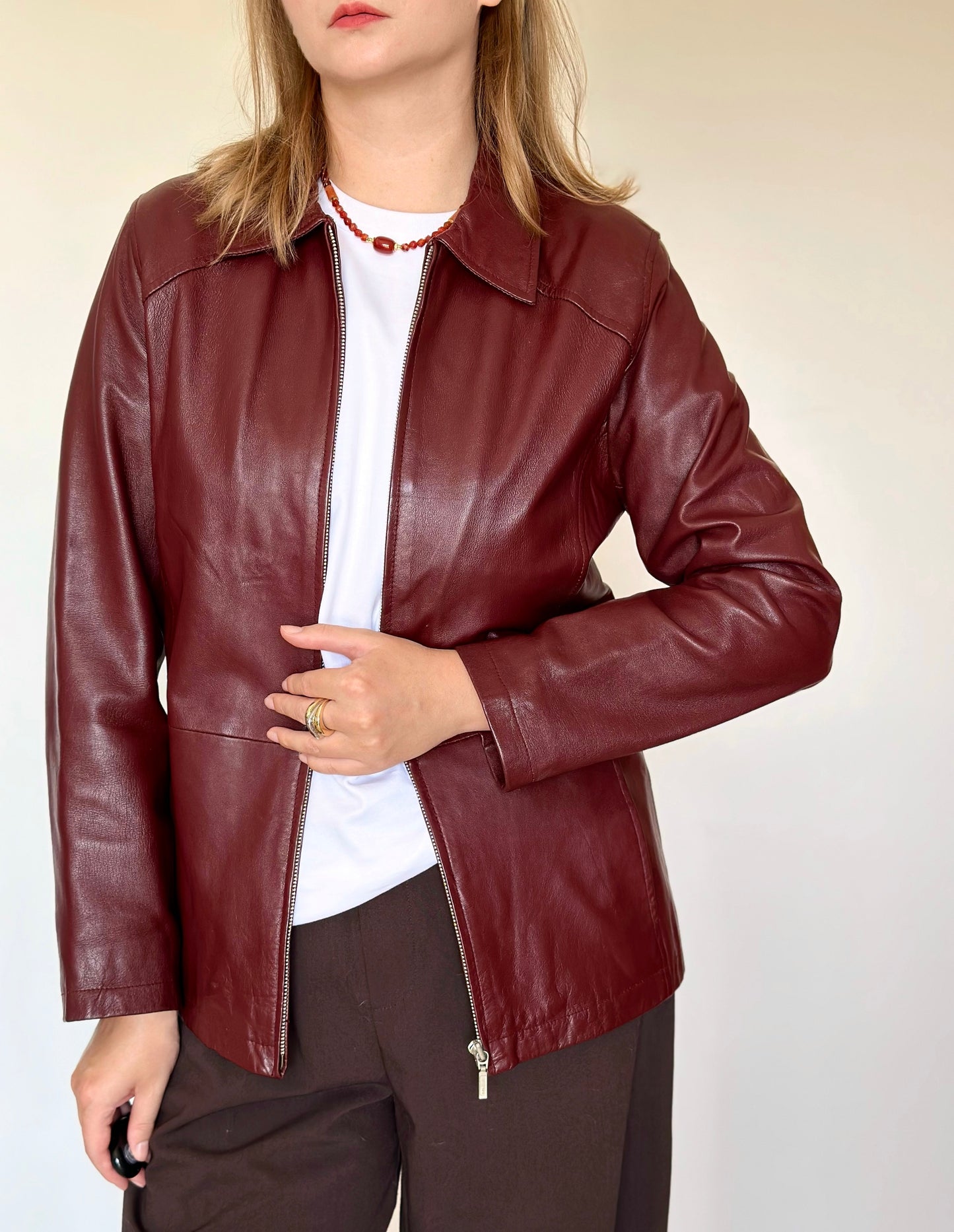Trendy vintage burgundy leather jacket