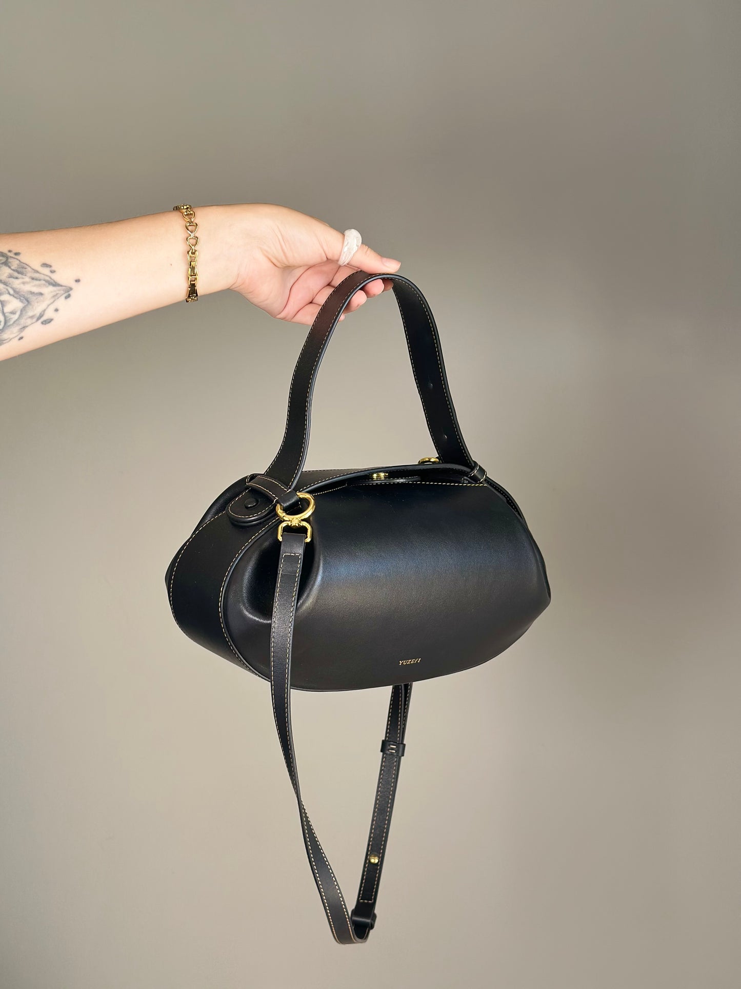 Stunning Yuzefi Loaf Bag crafted from black leather