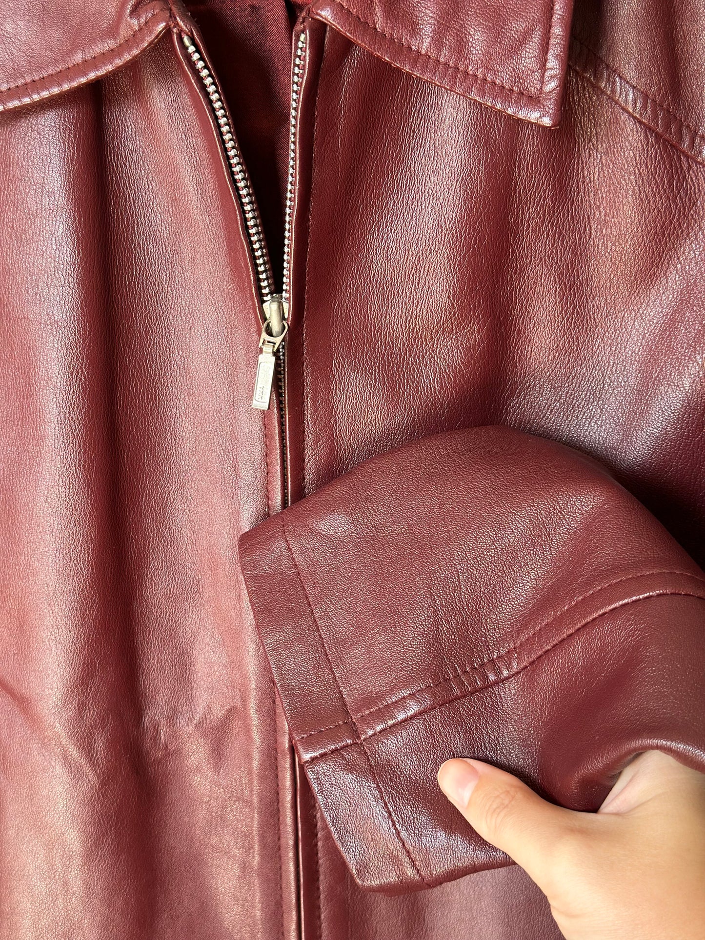 Trendy vintage burgundy leather jacket