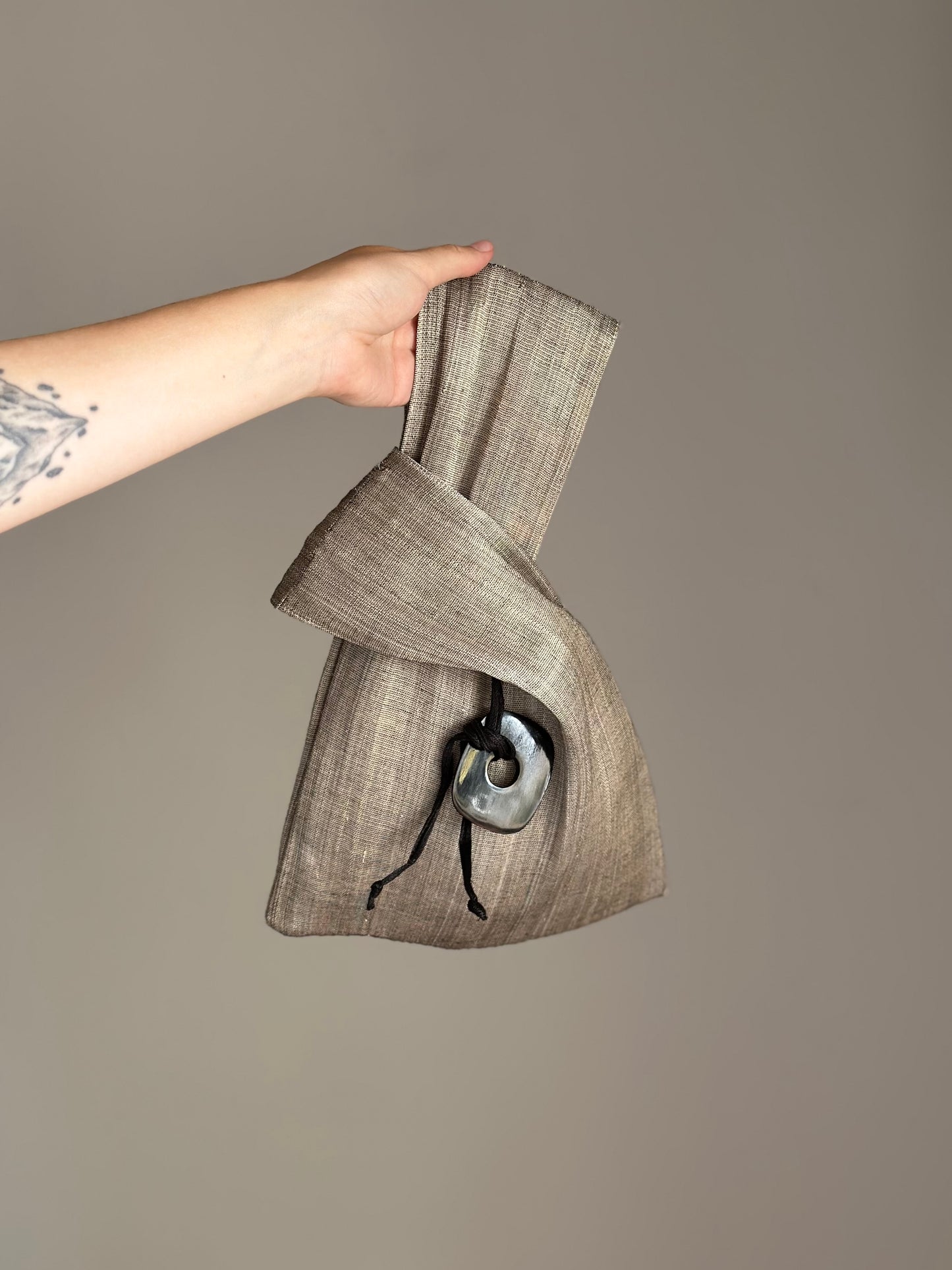 An elegant hand-held clutch