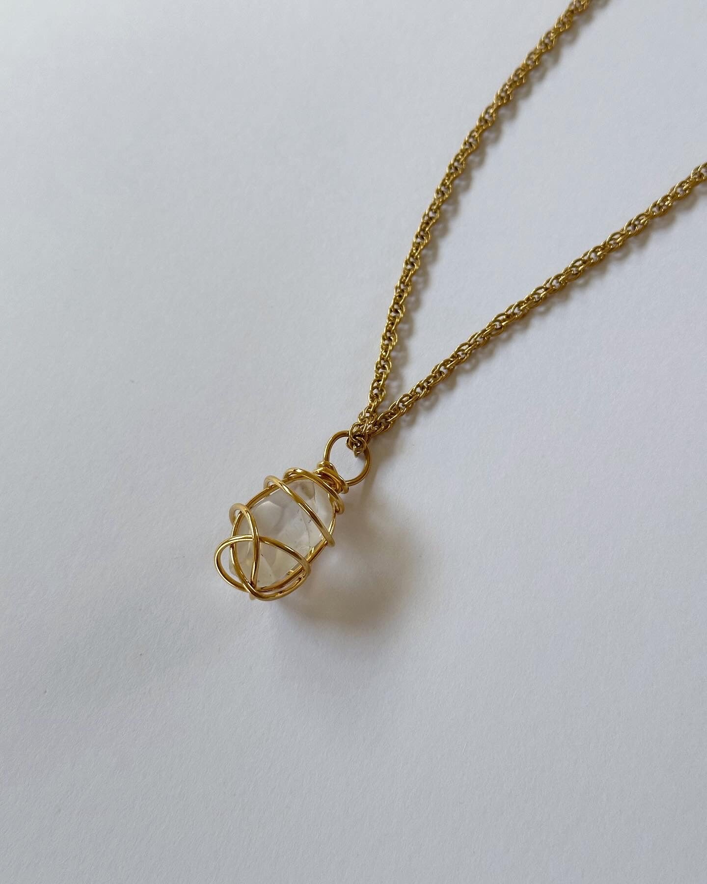 Vintage long gold-tone necklace with natural stone pendant by Avon