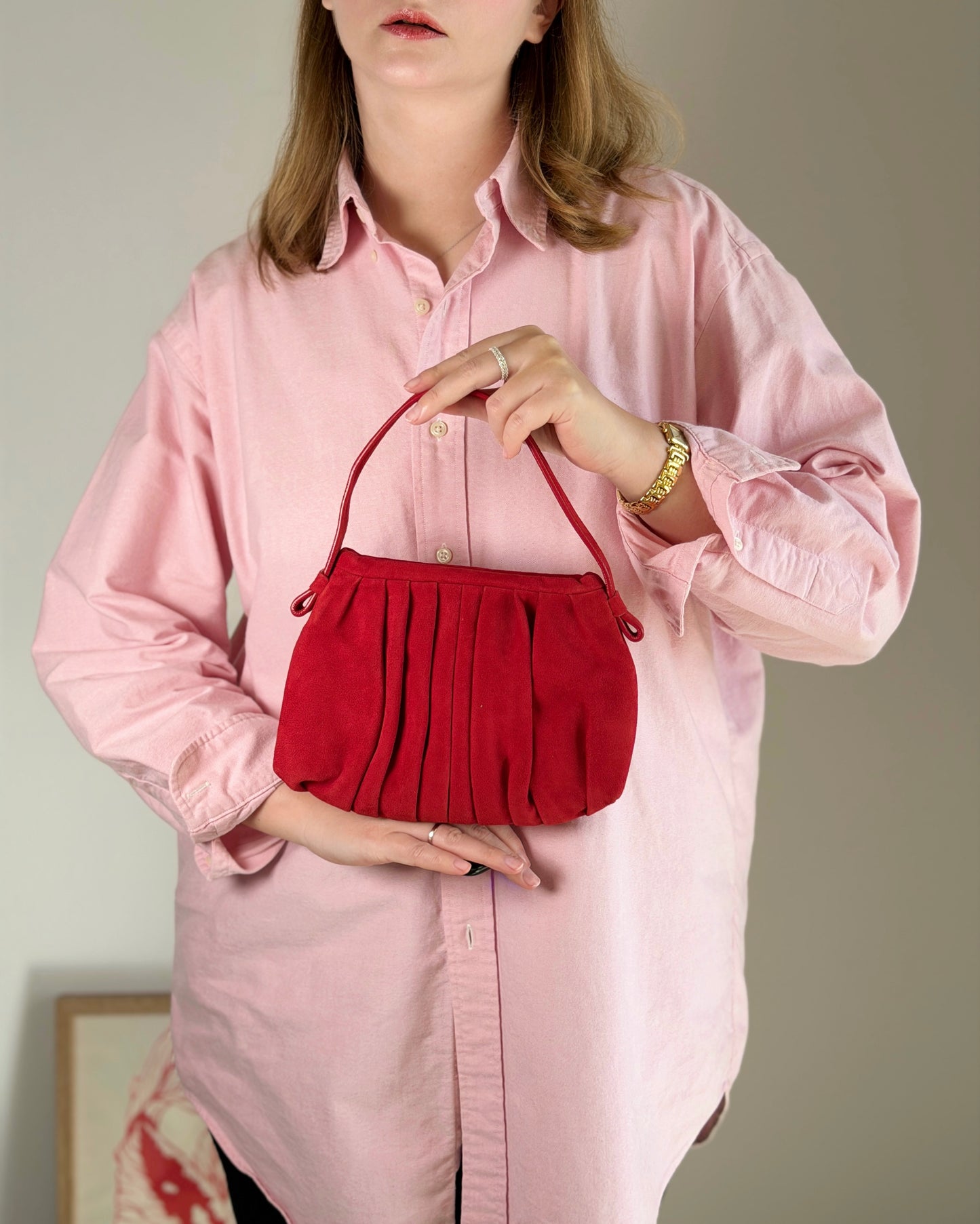 Vibrant red bag crafted from soft suede by Hobbs