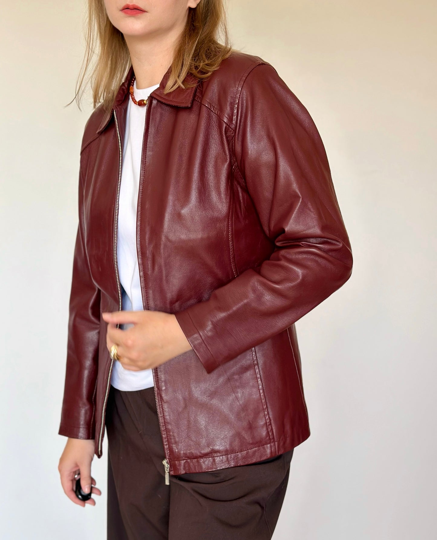 Trendy vintage burgundy leather jacket