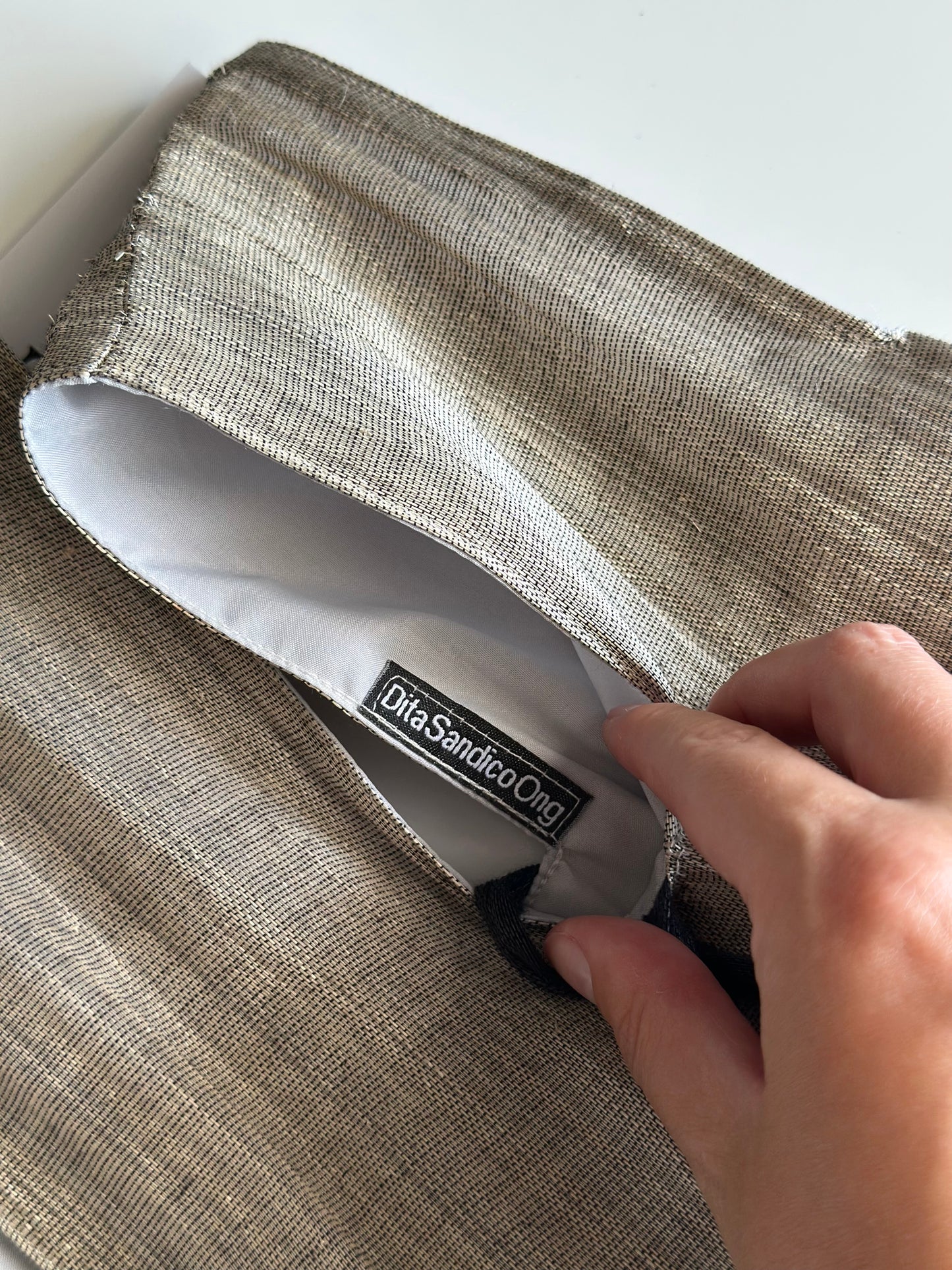 An elegant hand-held clutch