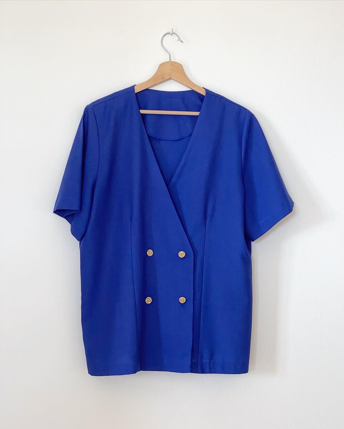 Vintage blouse with beautiful gold-tone buttons