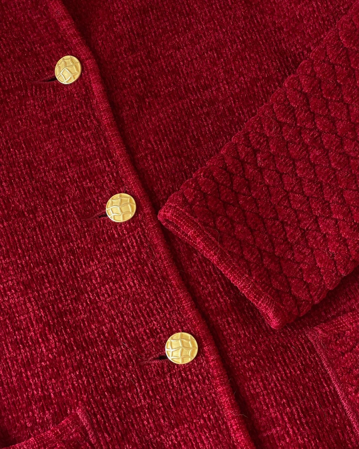 Vintage red suit with accent gold tone buttons (1980s).