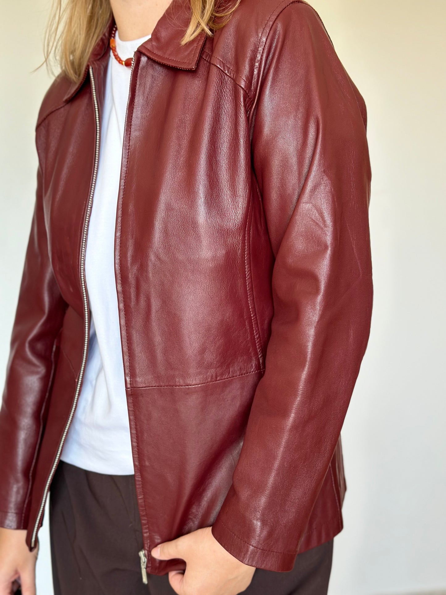 Trendy vintage burgundy leather jacket
