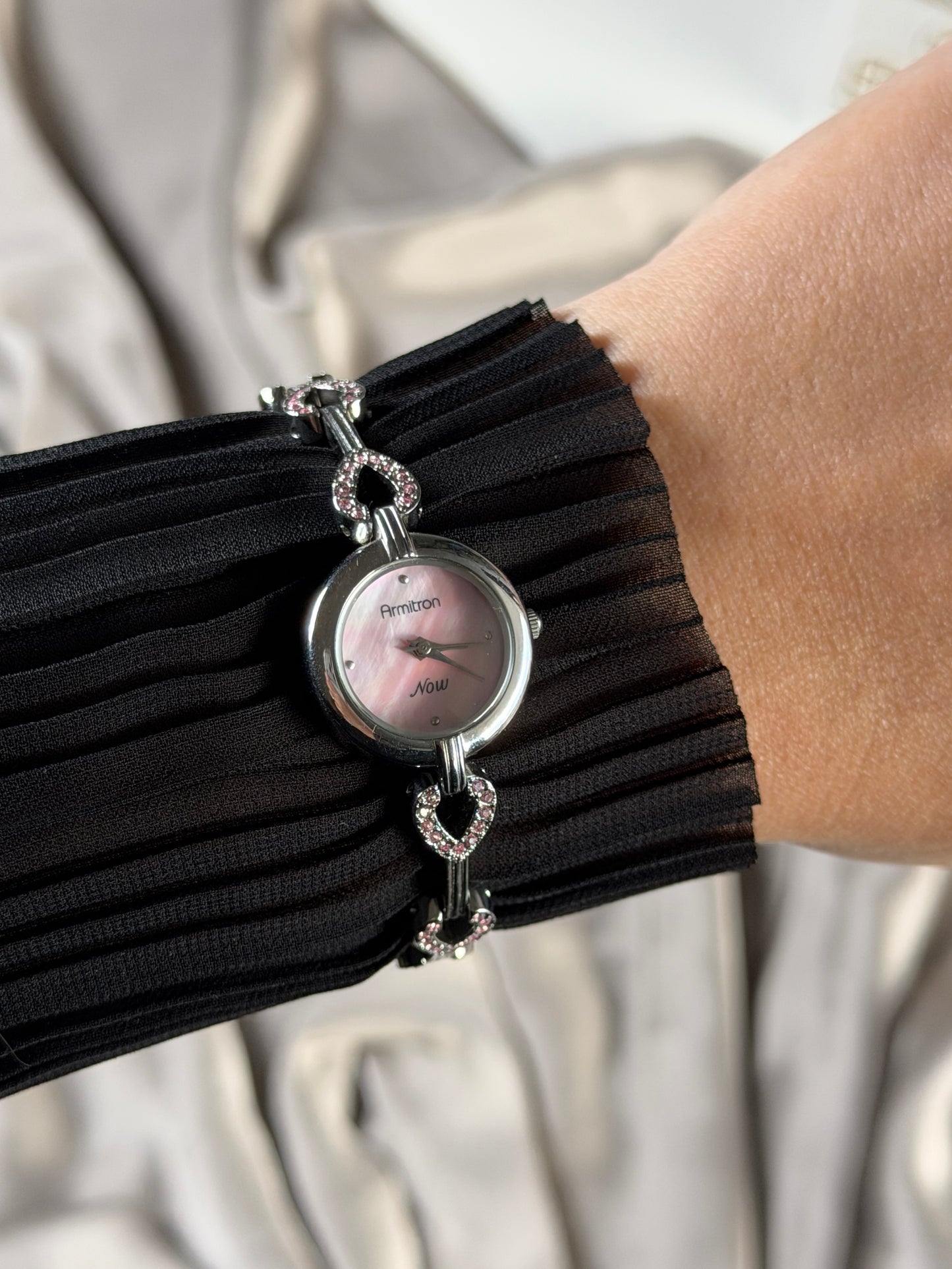 Charming vintage Armitron watch with heart links