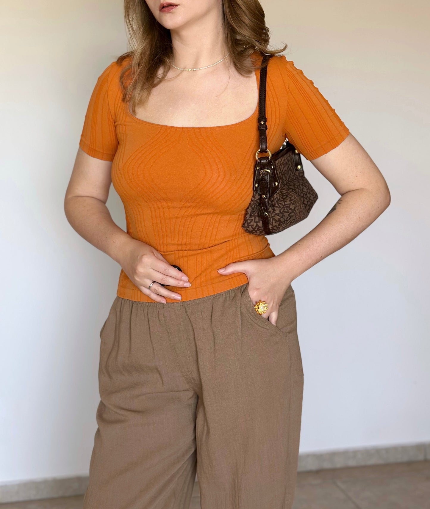 Vintage Wolford top in a striking orange hue
