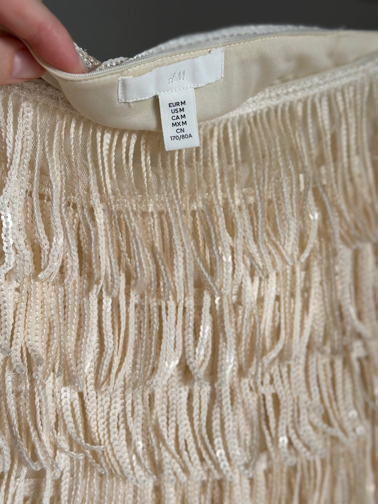 Amazing mini skirt with sequined fringes
