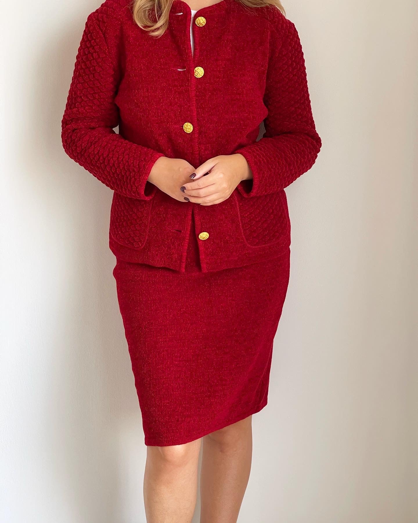 Vintage red suit with accent gold tone buttons (1980s).