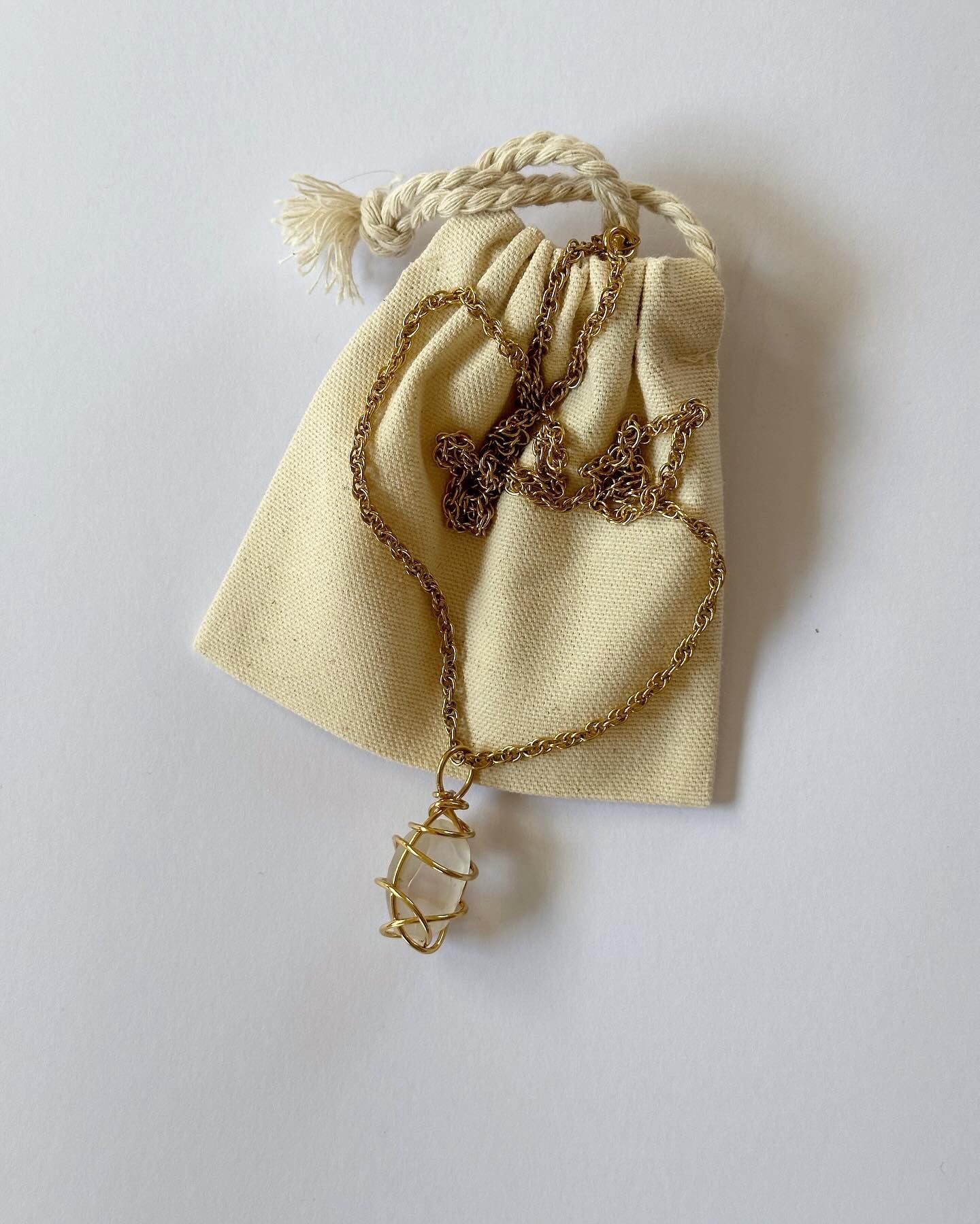 Vintage long gold-tone necklace with natural stone pendant by Avon