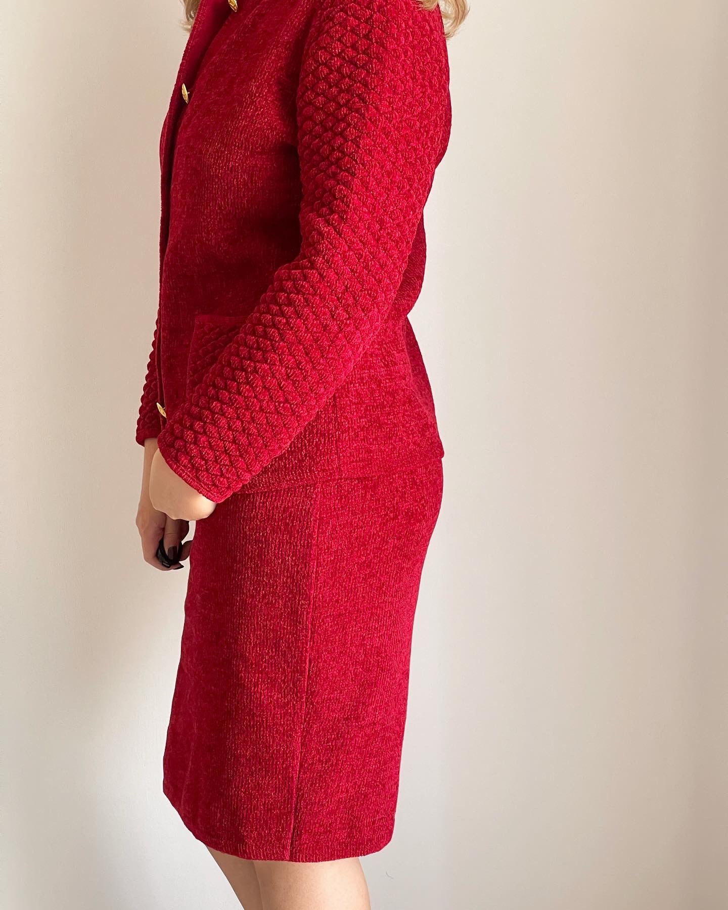 Vintage red suit with accent gold tone buttons (1980s).