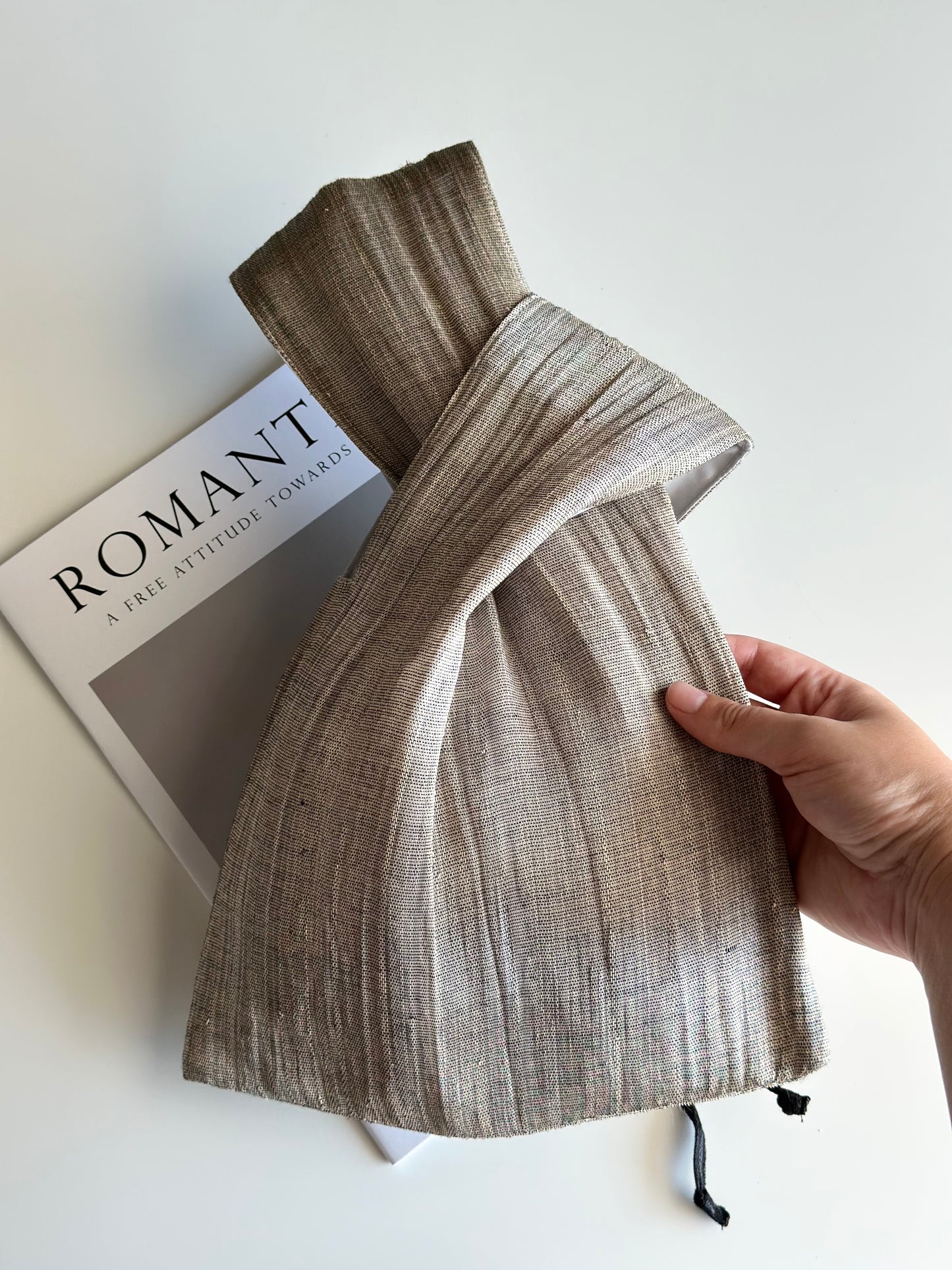 An elegant hand-held clutch