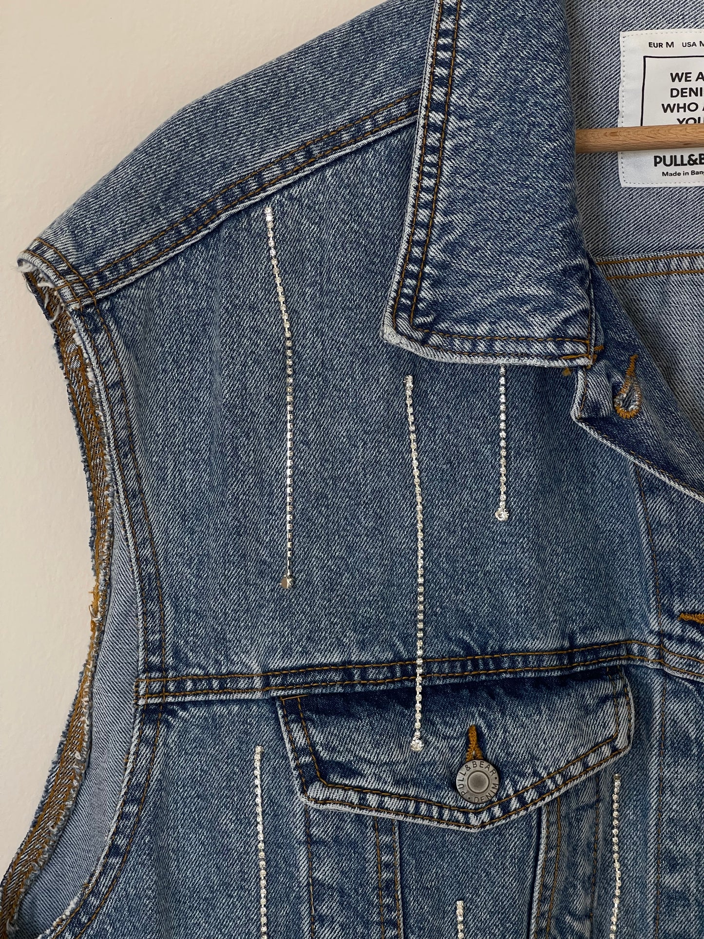 Lovely oversized denim waistcoat hand-decorated with rhinestone crystal chain