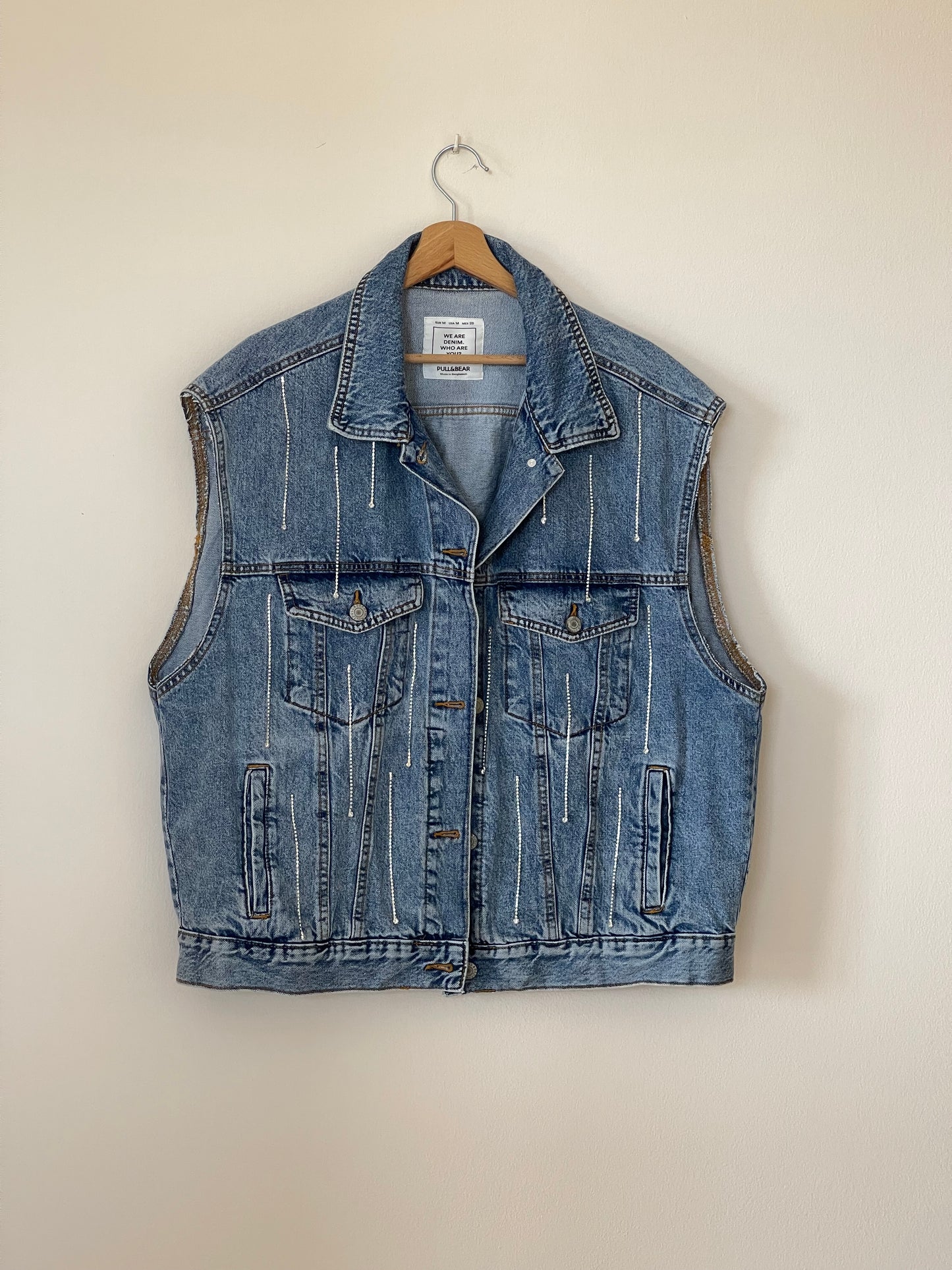 Lovely oversized denim waistcoat hand-decorated with rhinestone crystal chain